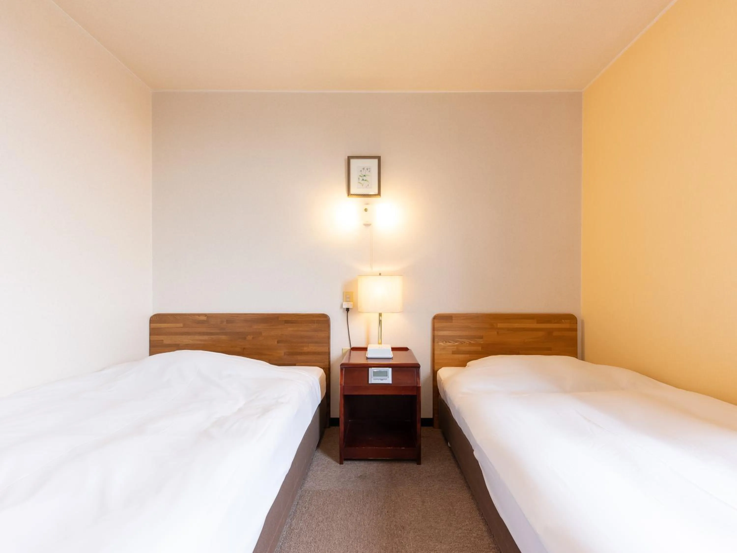 Bed in Tabist Travel Inn Shinshu Nakano