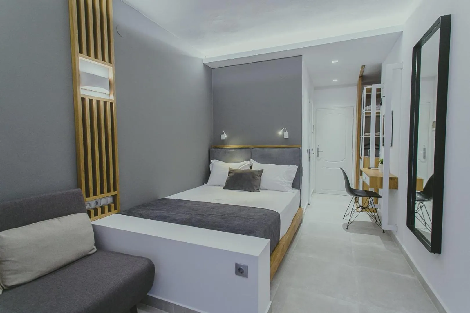 Living room, Bed in Hotel Papagalos