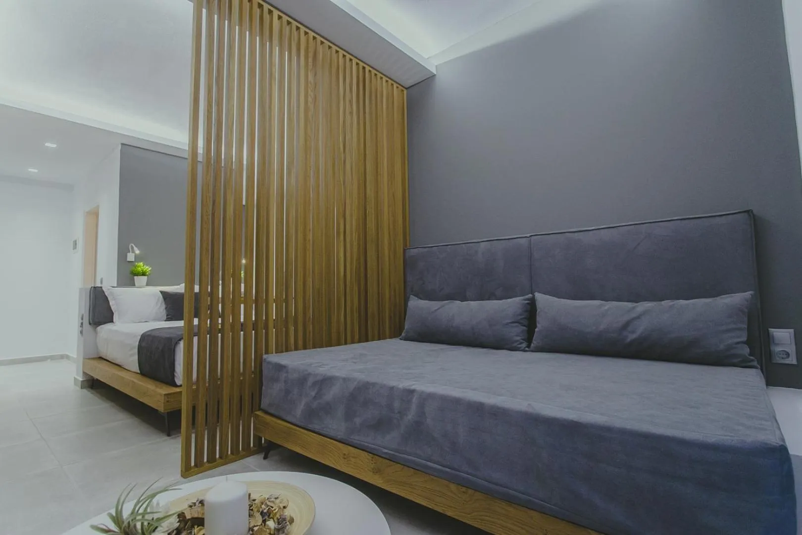 Living room, Bed in Hotel Papagalos