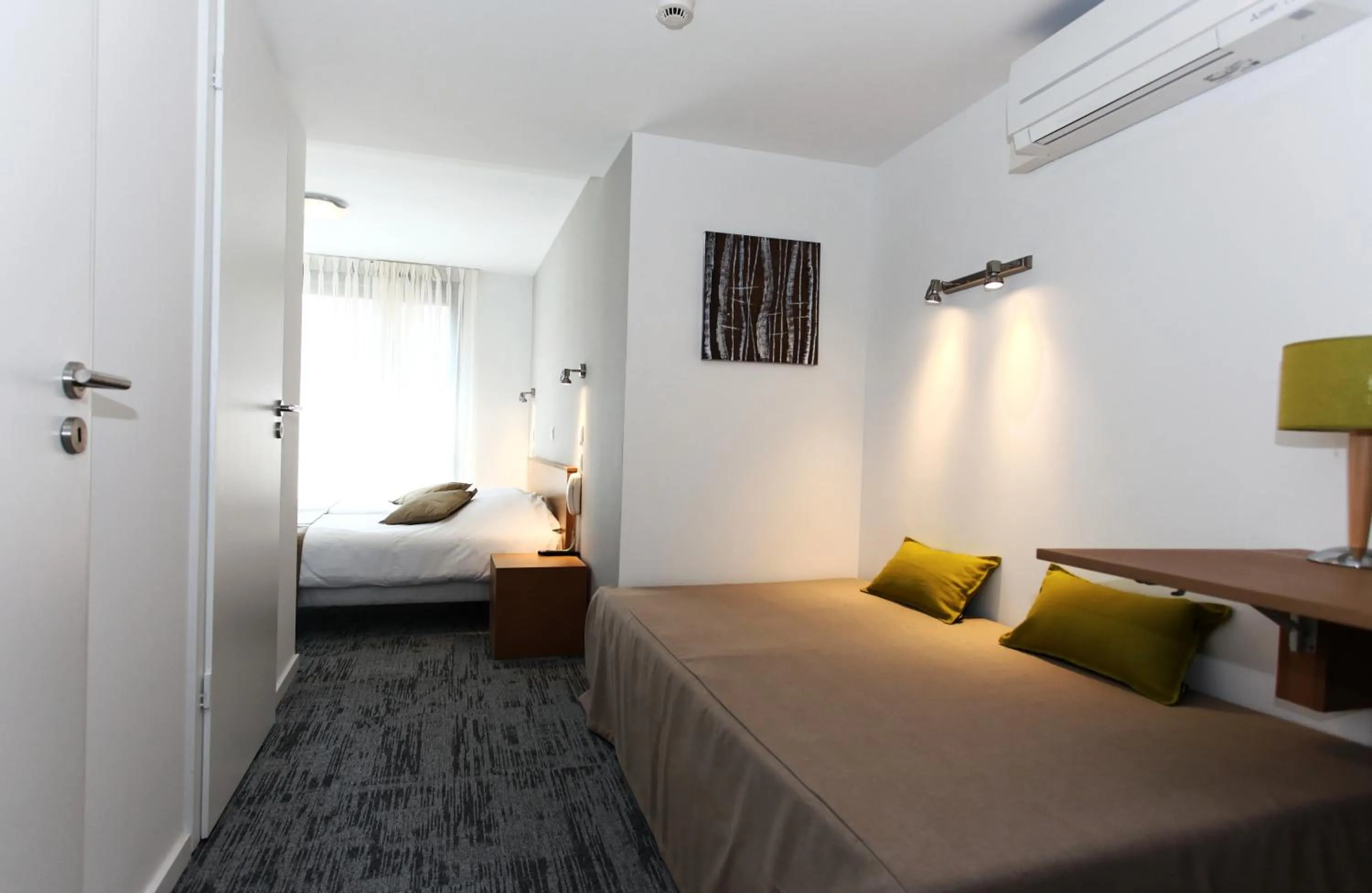 Bed in Hôtel De L'Ill