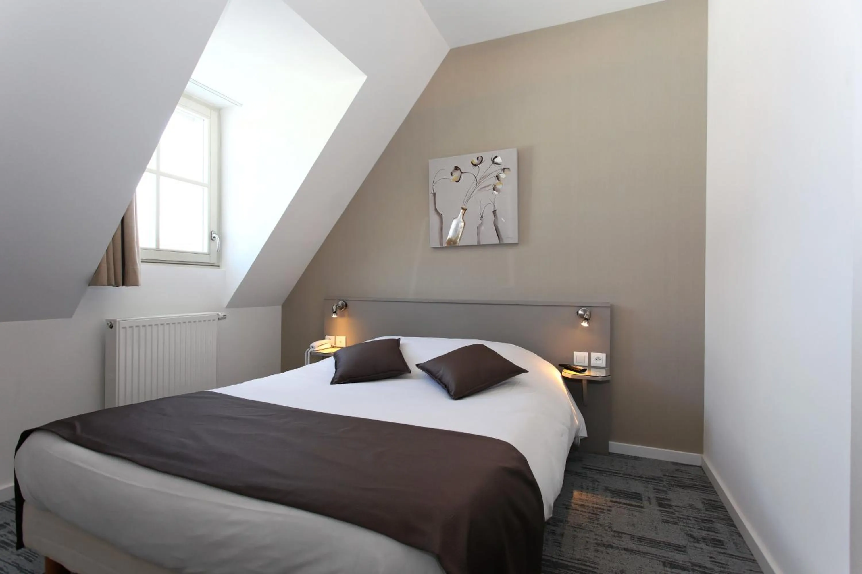 Bed in Hôtel De L'Ill