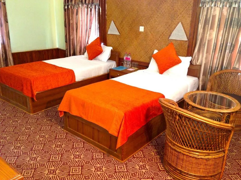 Bed in Himalayan Deurali Resort