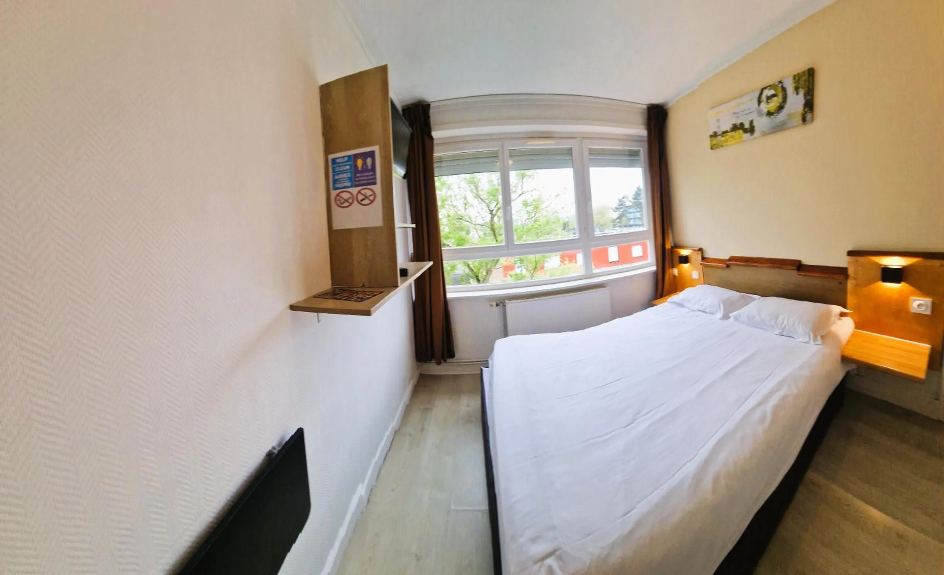 Bed in Hôtel OpalOriental