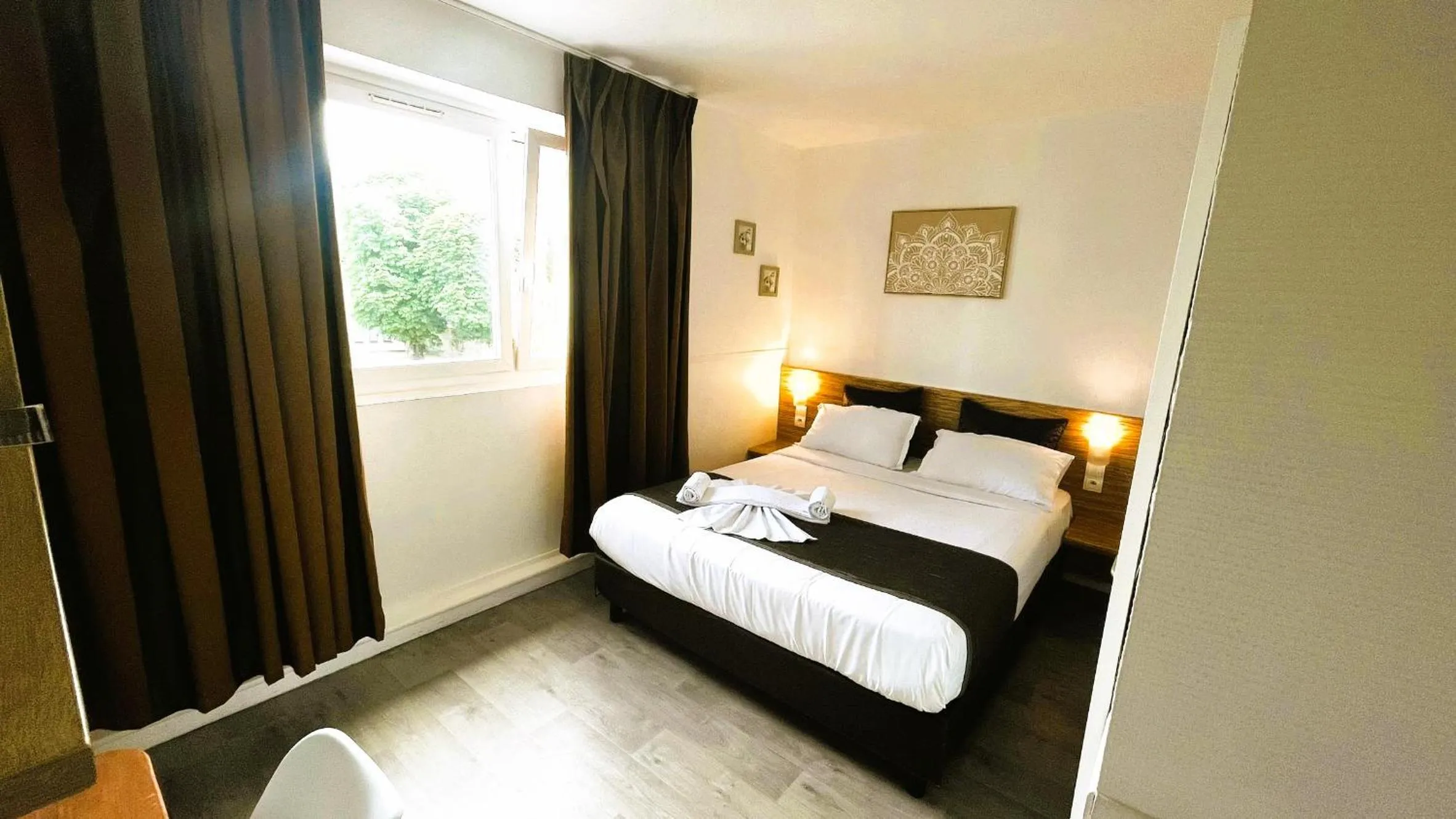 Bed in Hôtel OpalOriental