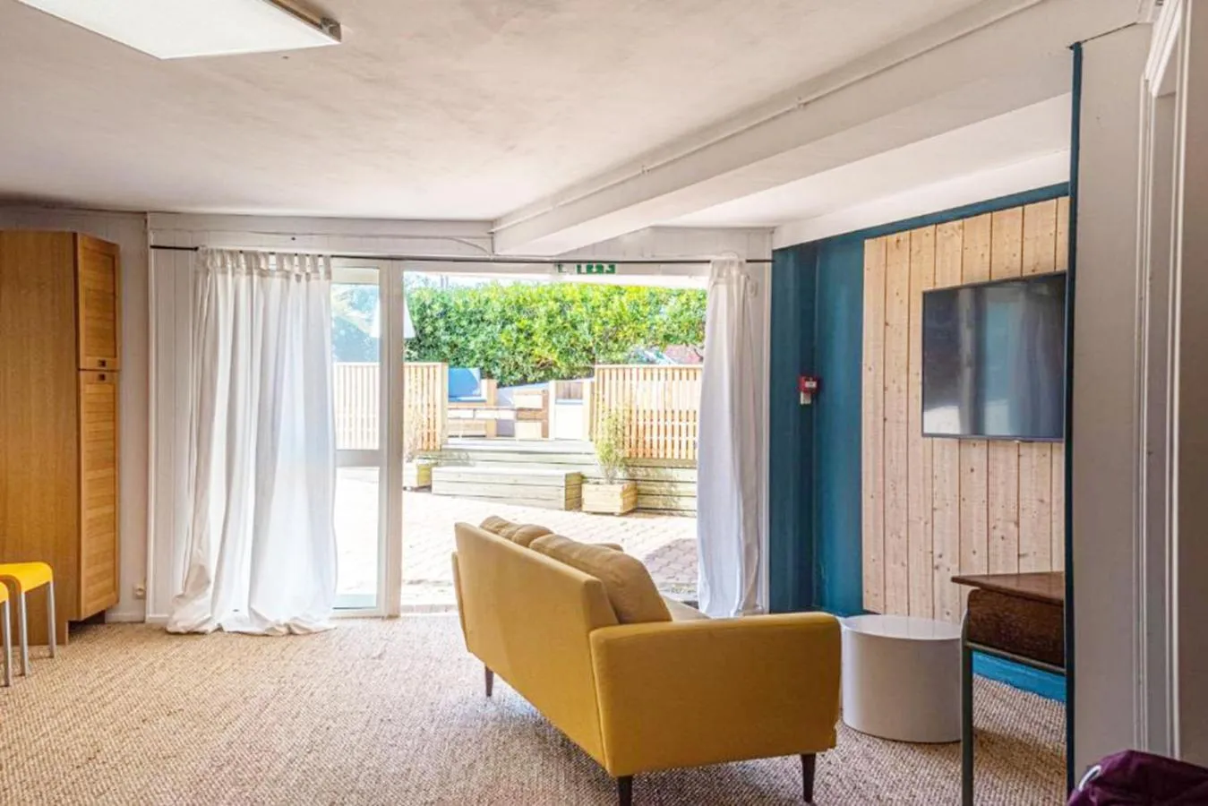 Communal lounge/ TV room in Naéco Le Pouldu