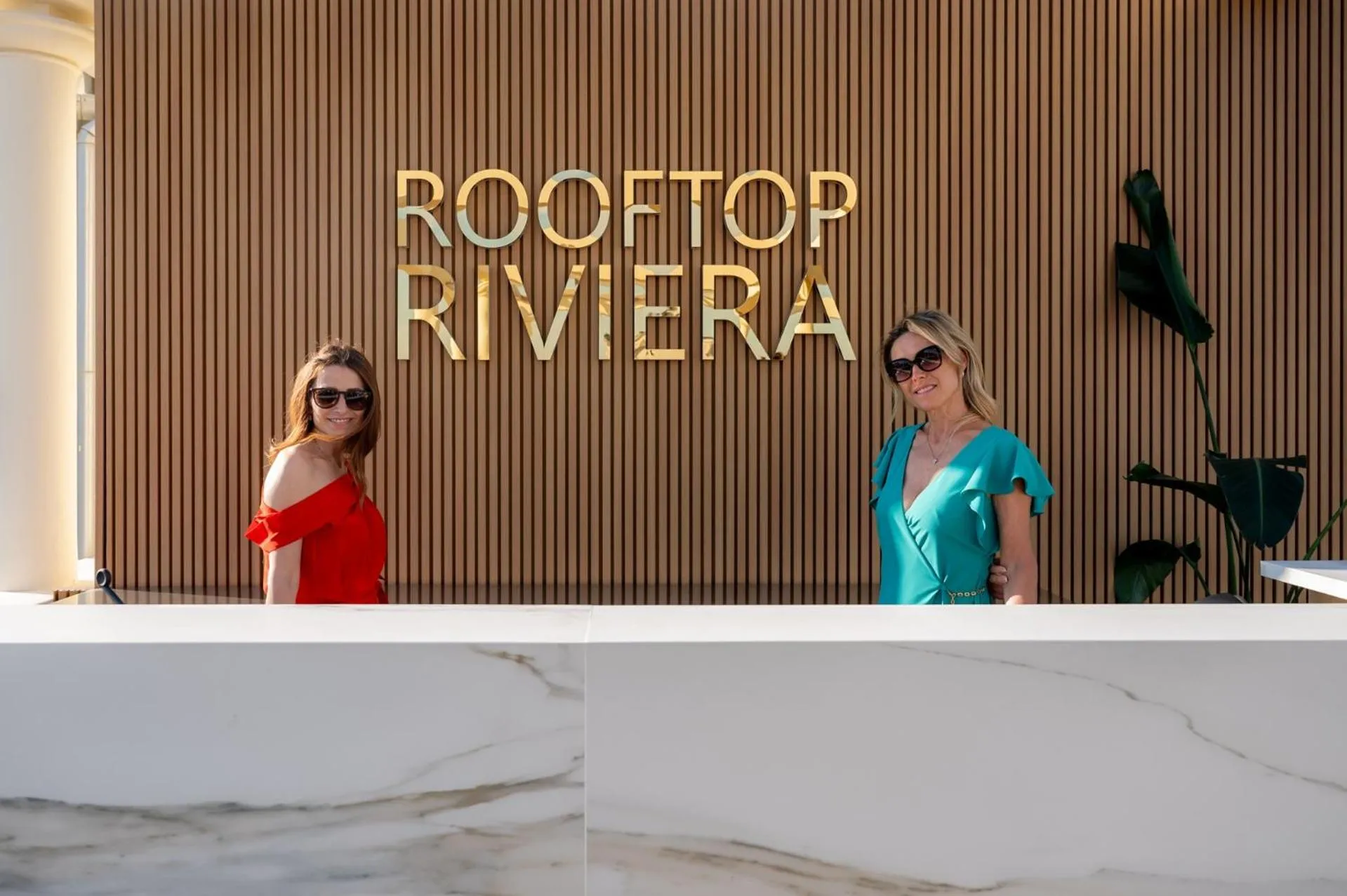 Property logo or sign in Hotel Riviera