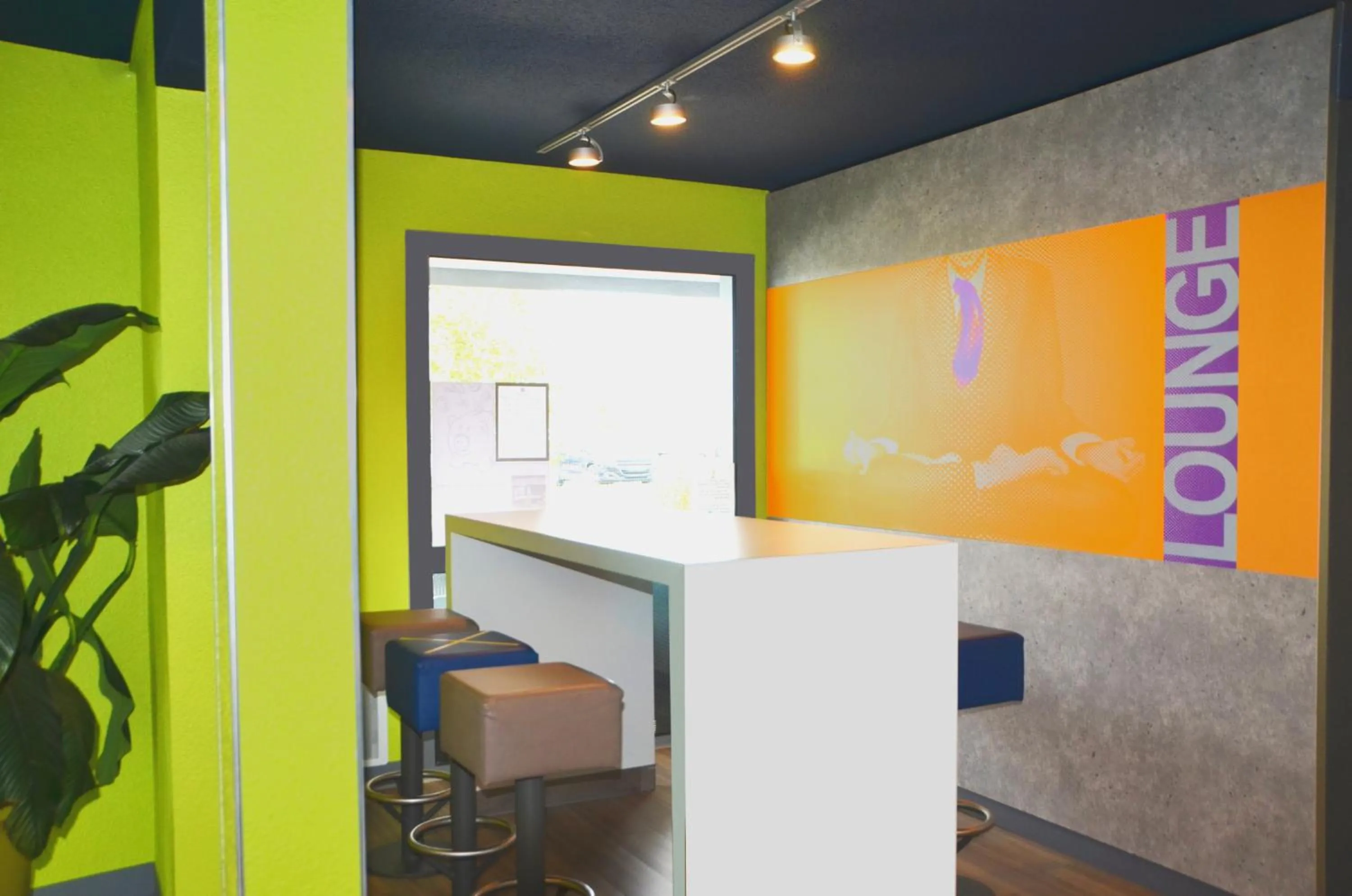 Lobby or reception in ibis budget Rouen Nord Isneauville