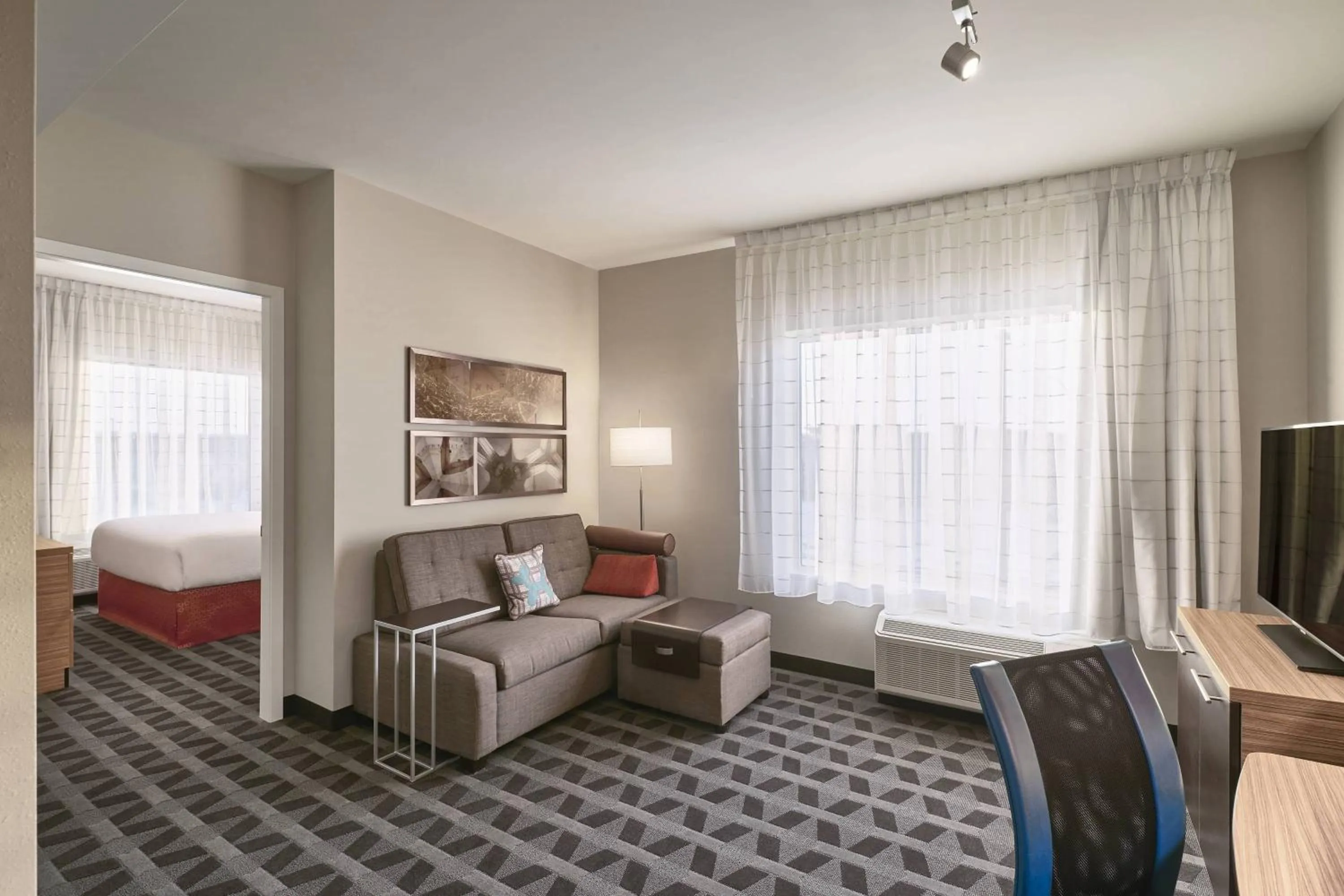 Living room, Bed in TownePlace Suites by Marriott Medicine Hat