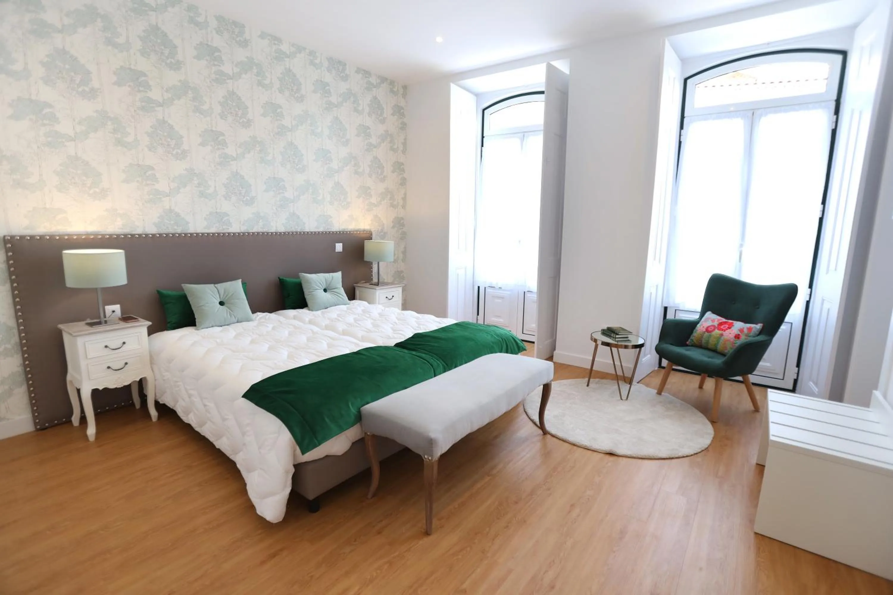 Bed in Glass Boutique - Rooms & Suites