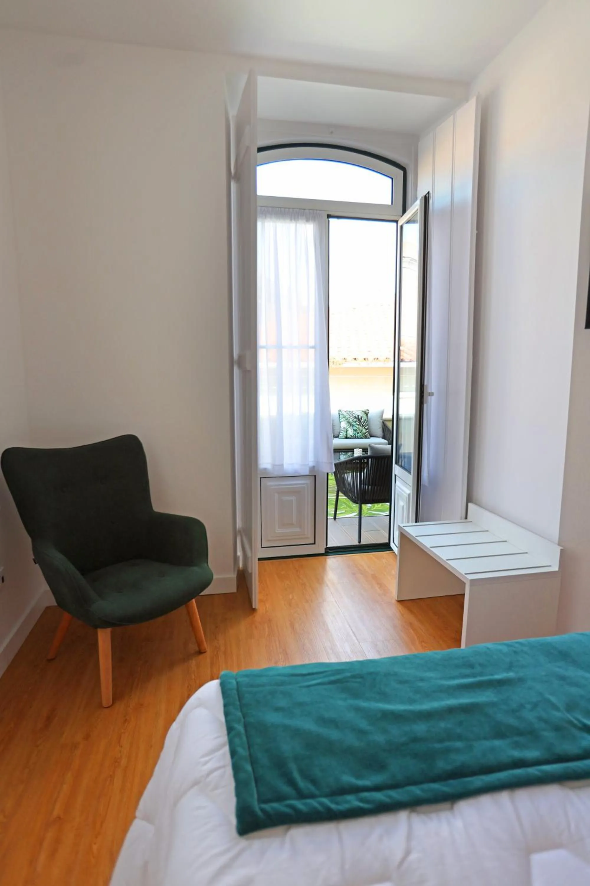 Bed in Glass Boutique - Rooms & Suites