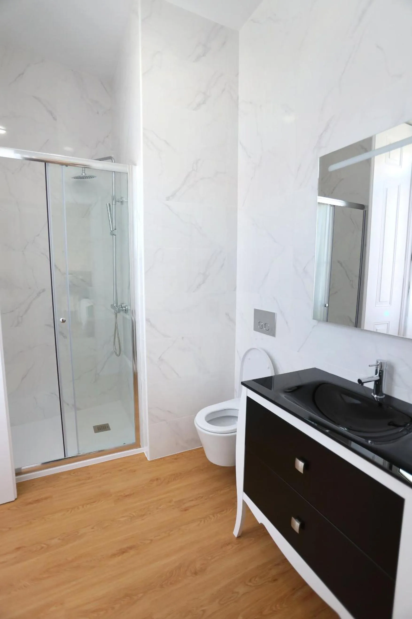 Bathroom in Glass Boutique - Rooms & Suites