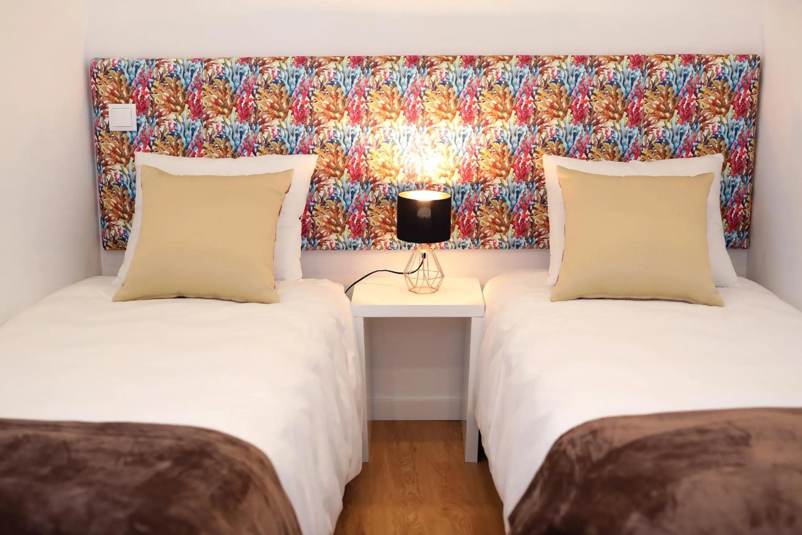 Bed in Glass Boutique - Rooms & Suites