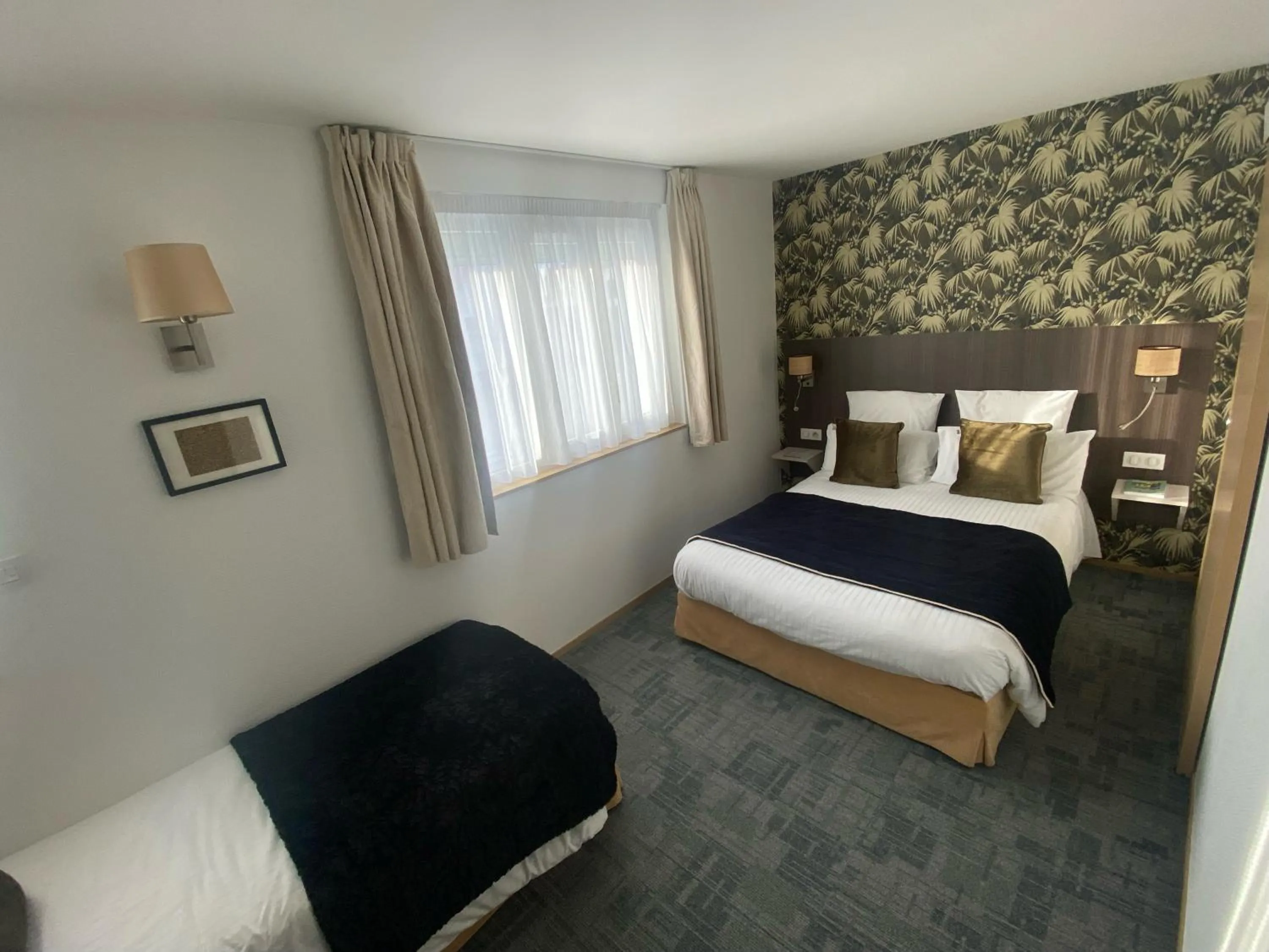 Bed in Cit'Hotel Hôtel de France et d'Europe