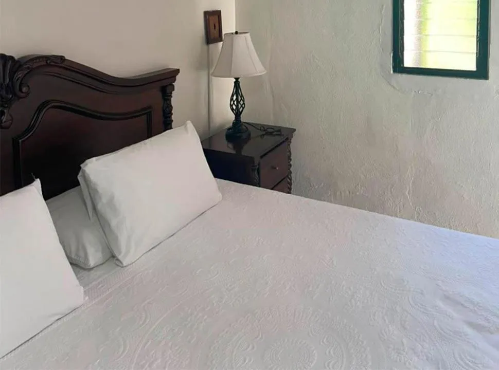 Bed in Hotel Casa Blanca by Rotamundos