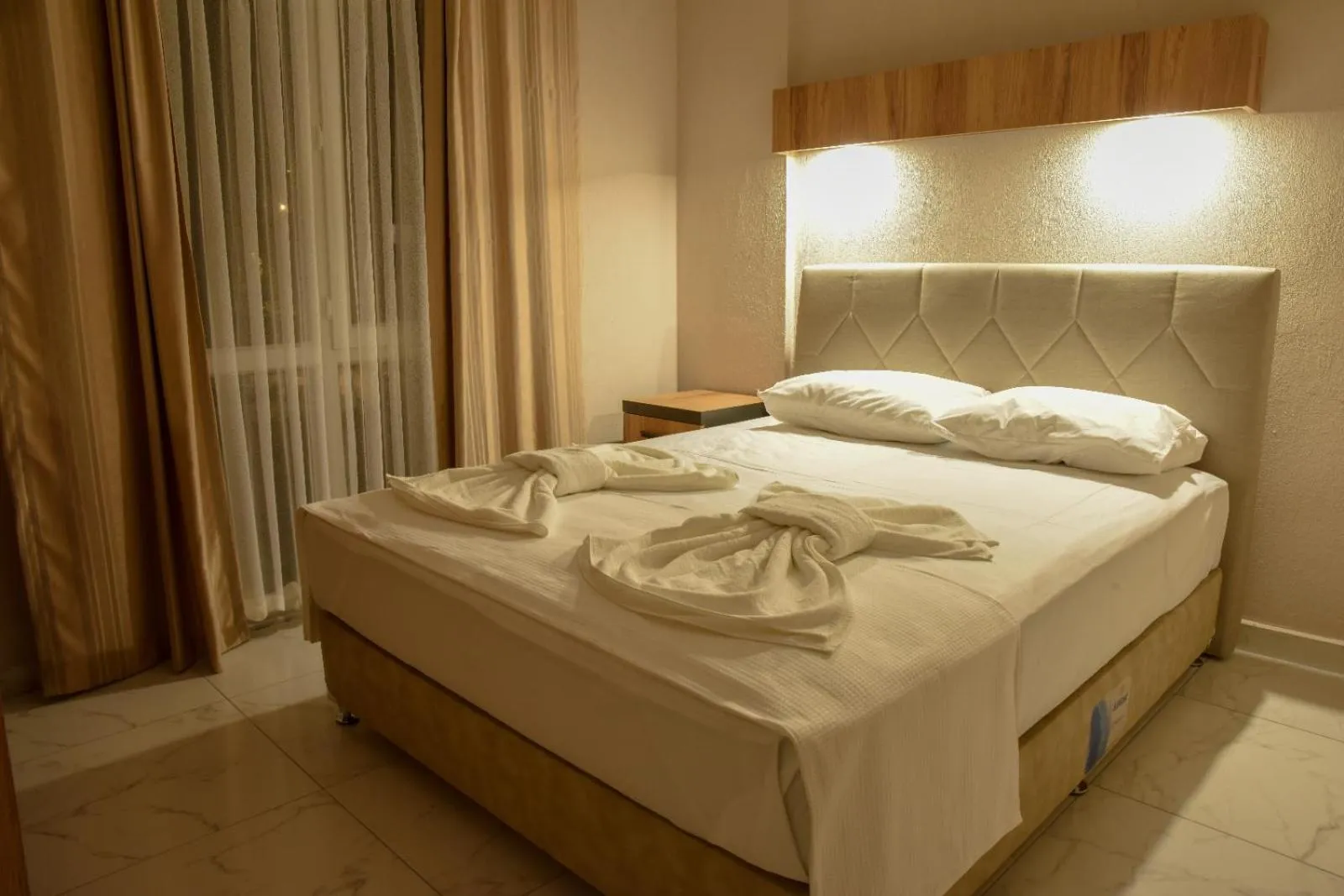 Bed in İRBEÇ APART & BUNGALOW