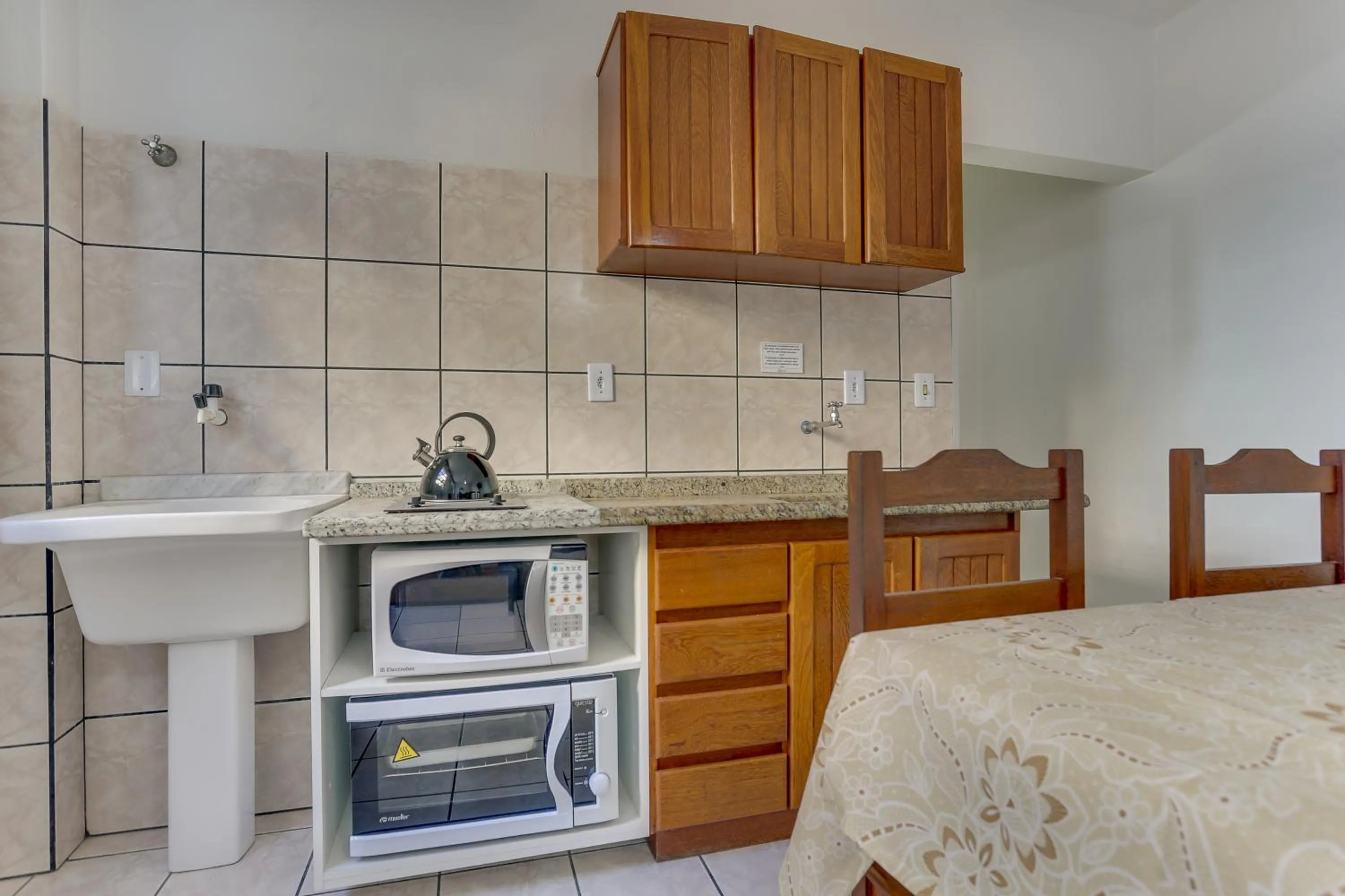 Communal kitchen in Marazul Apart Hotel