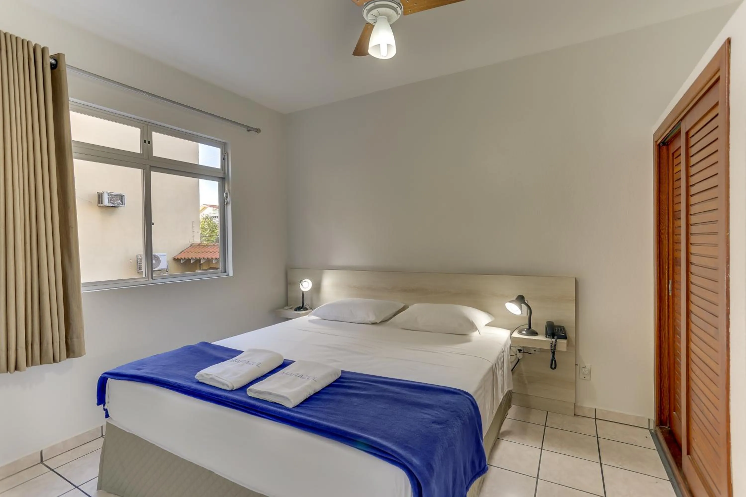 Bed in Marazul Apart Hotel