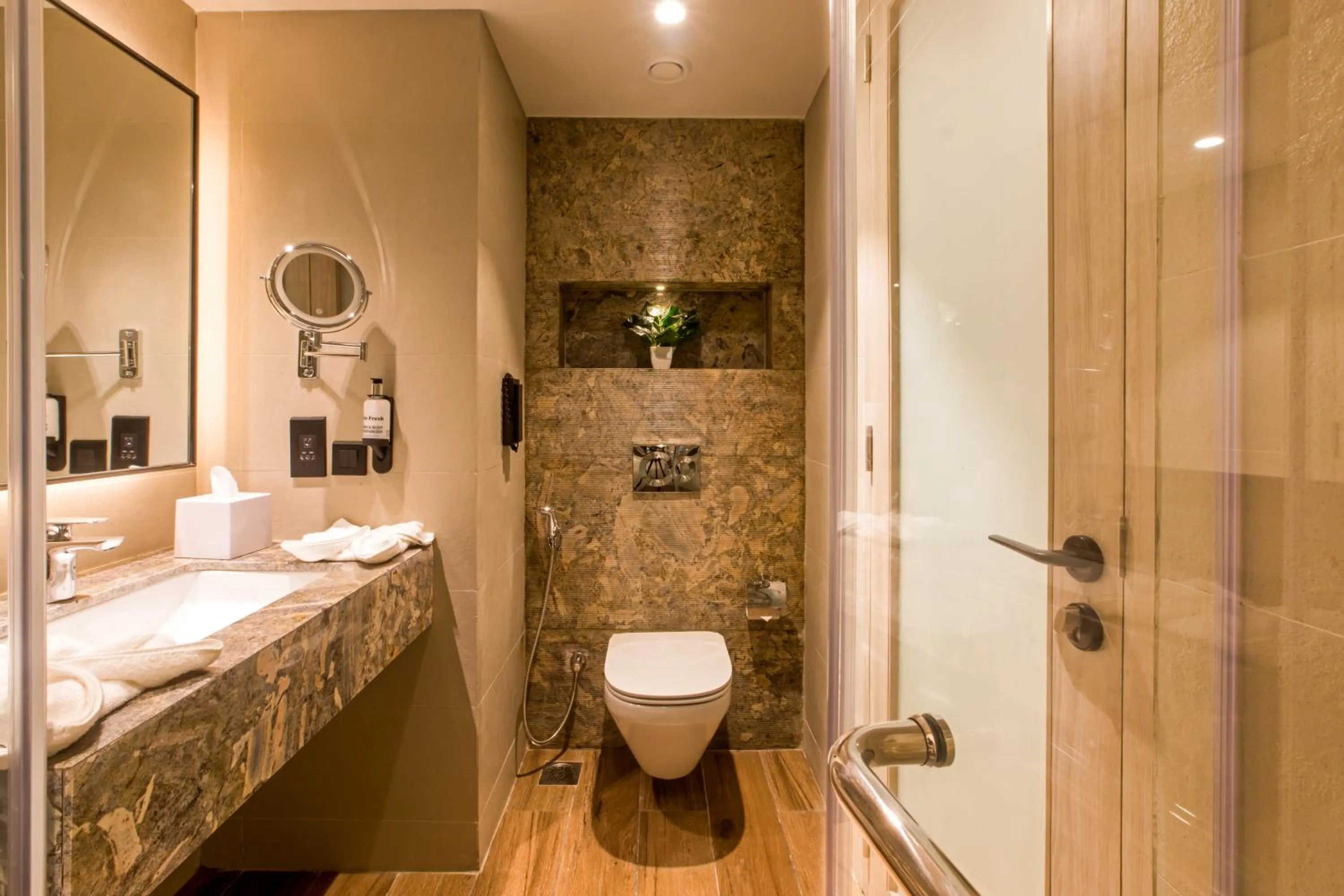 Toilet, Bed in Regenta SGS Greenotel - Lonavala