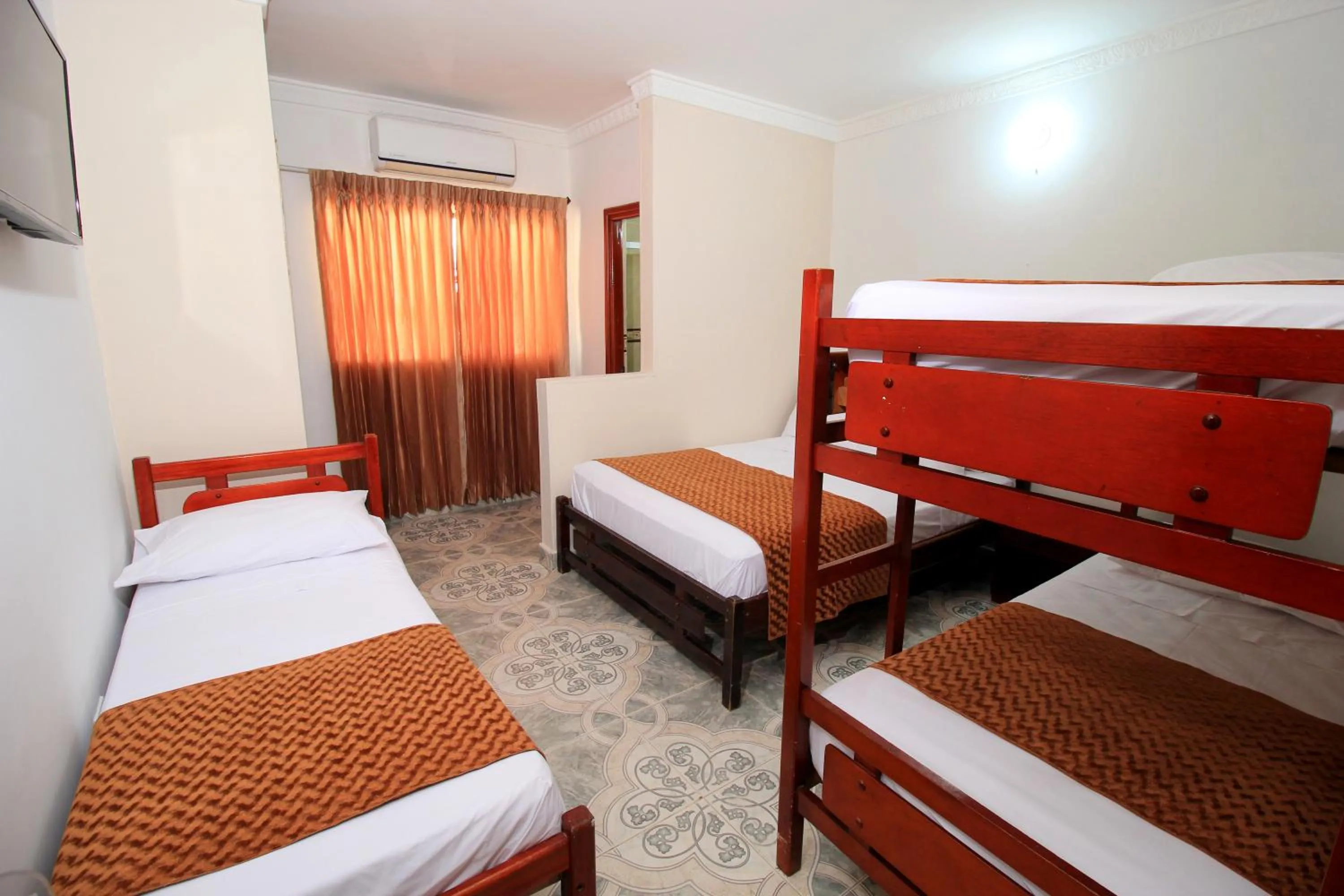 Bed in Hotel Rodadero Inn By GEH Suites