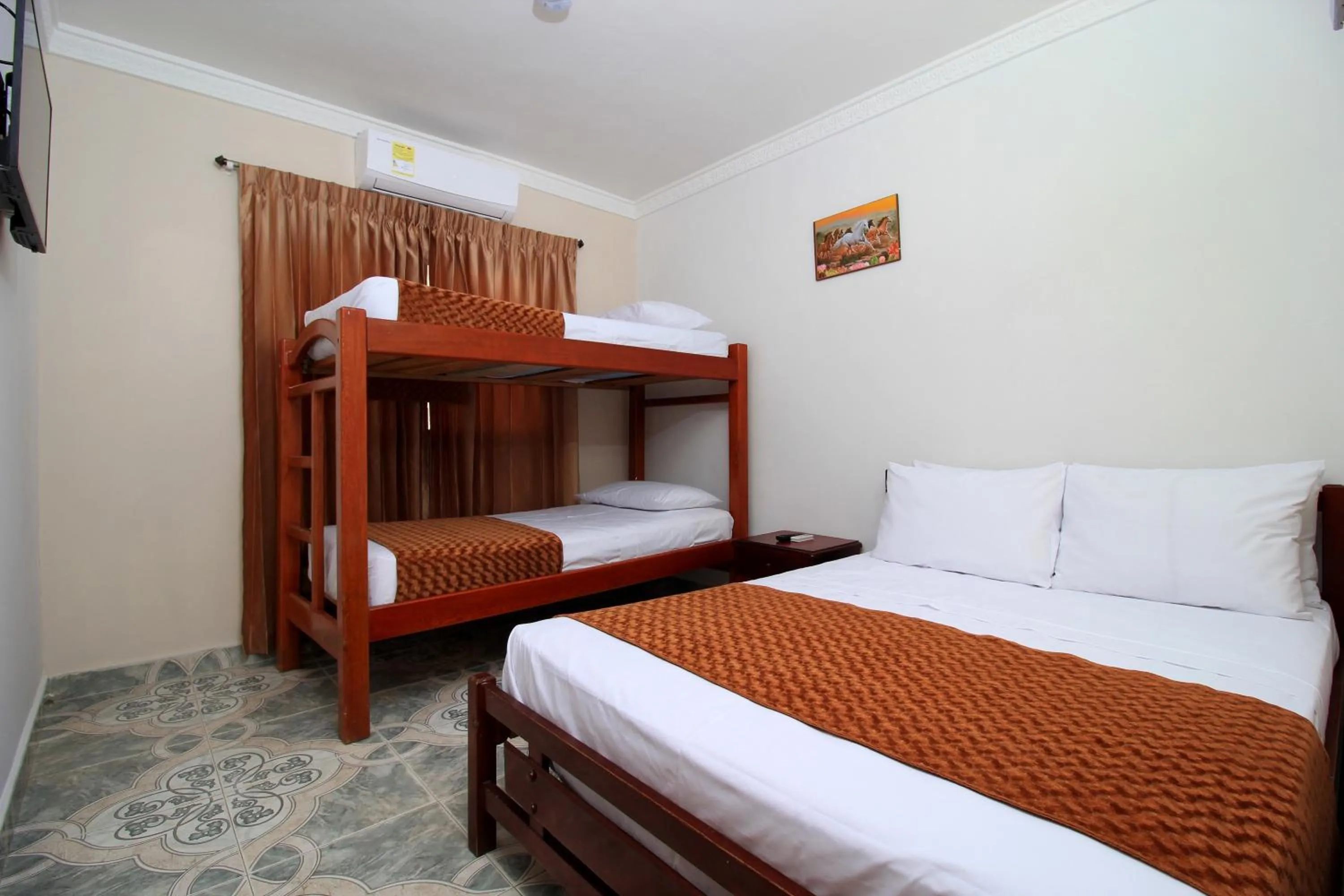 Bed in Hotel Rodadero Inn By GEH Suites
