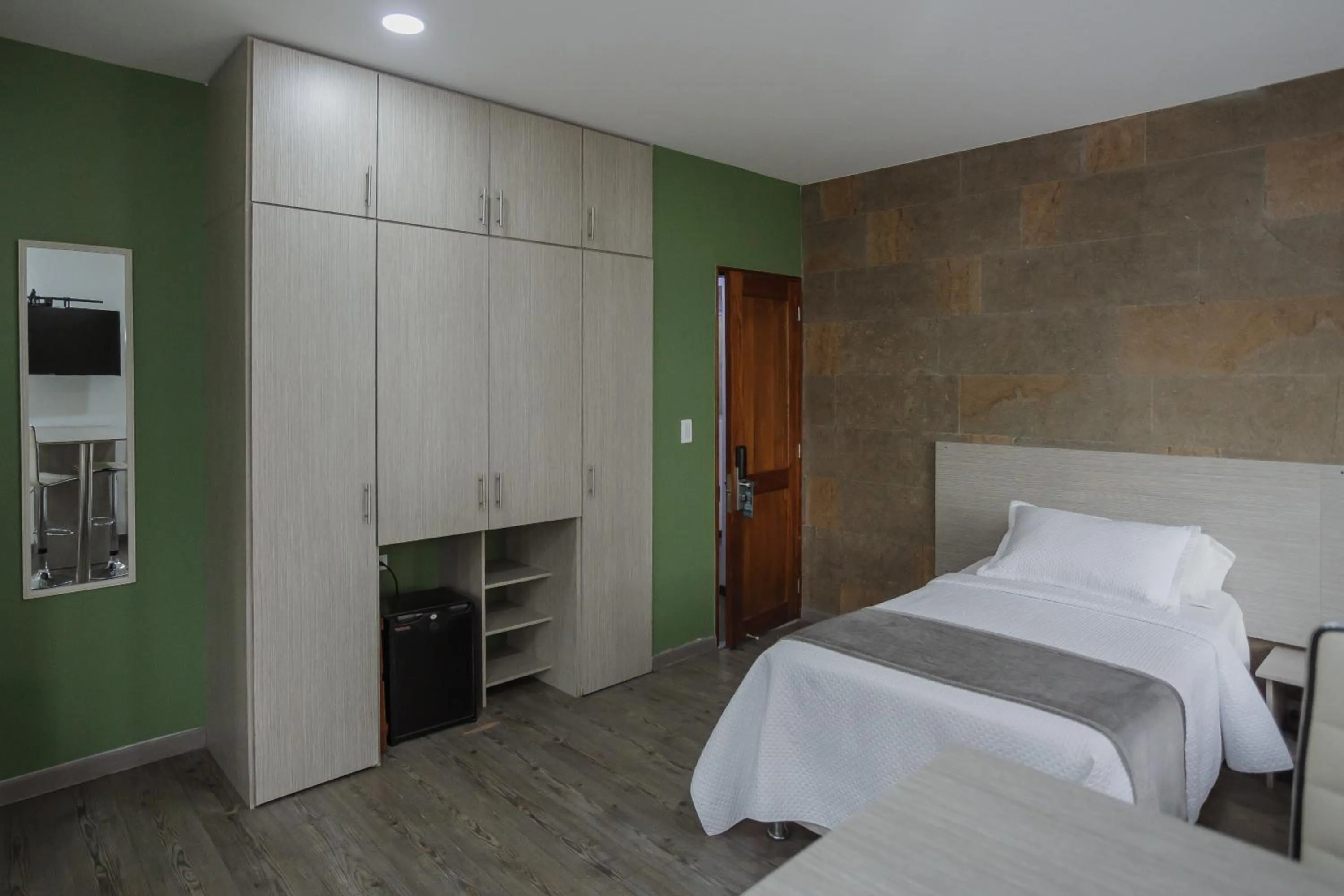 Bed in Hotel Portón Sabaneta