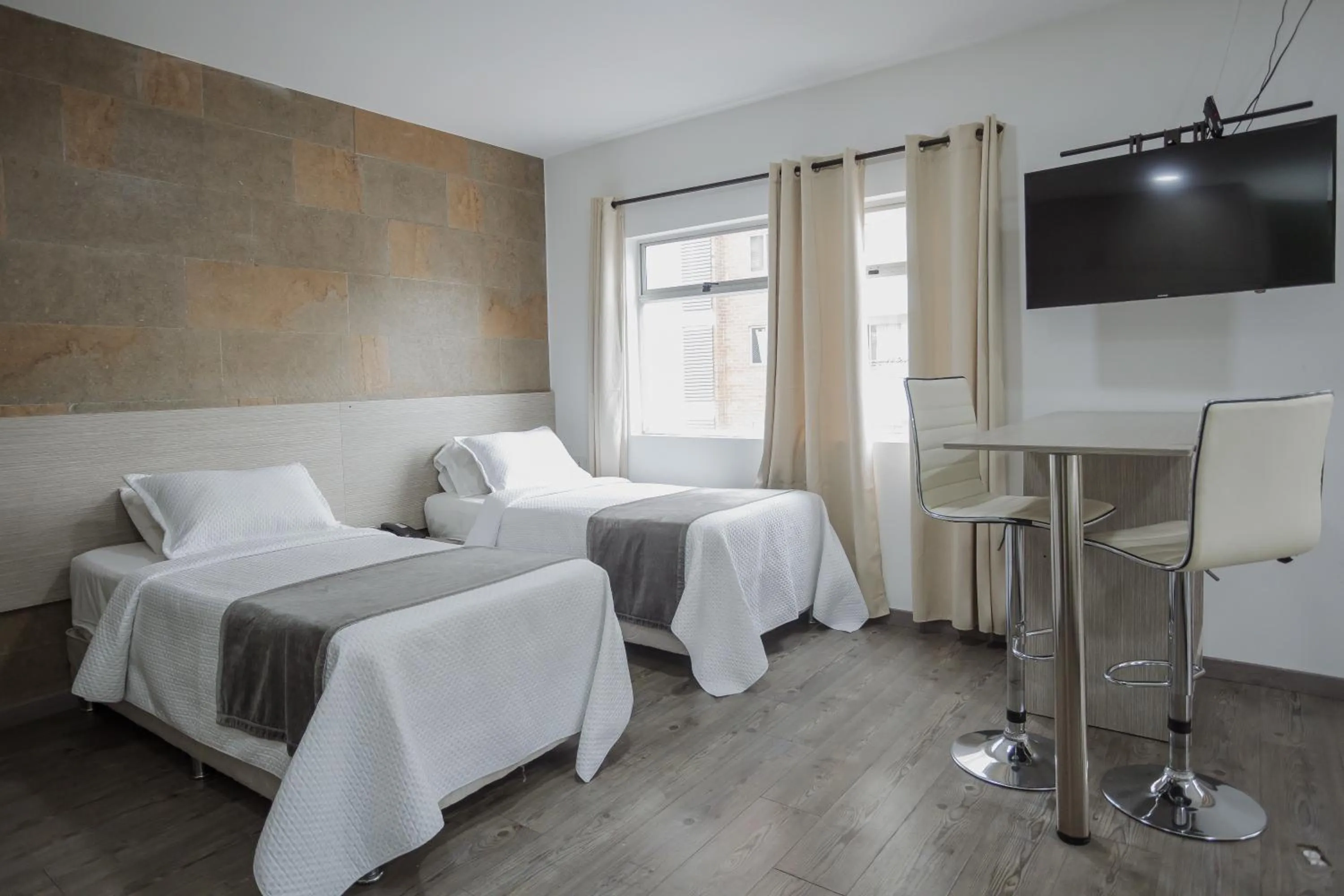 Bed in Hotel Portón Sabaneta