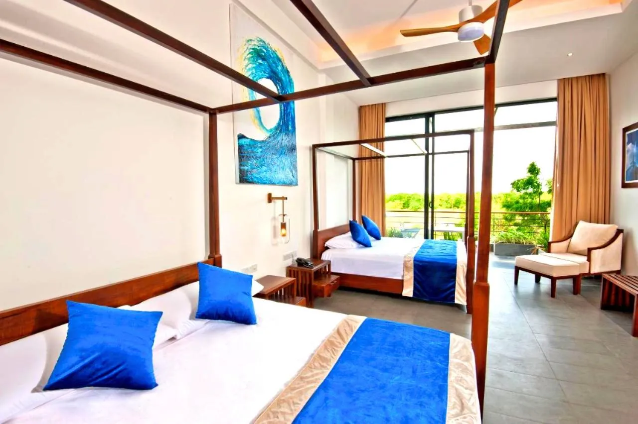 Photo of the whole room, Bed in The Lake Forest Hotel