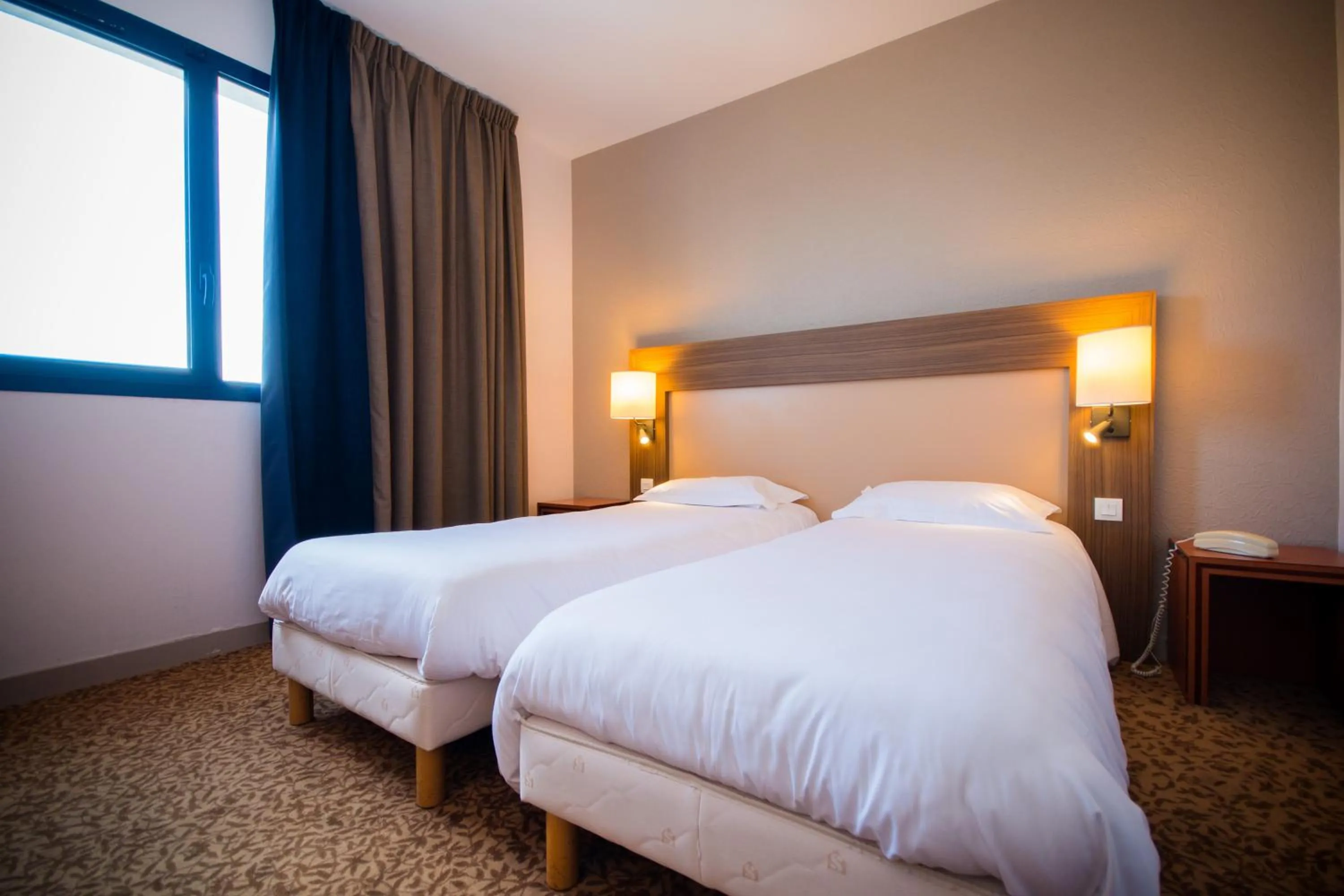 Bed in Brit Hotel Saint Malo – Le Transat