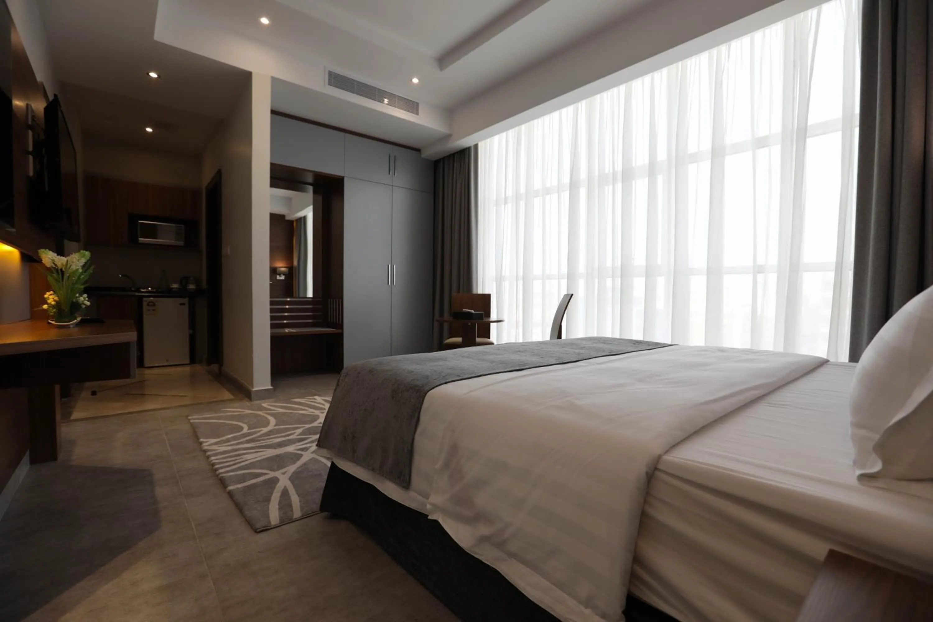 Bed in Diamond Tower Hotel