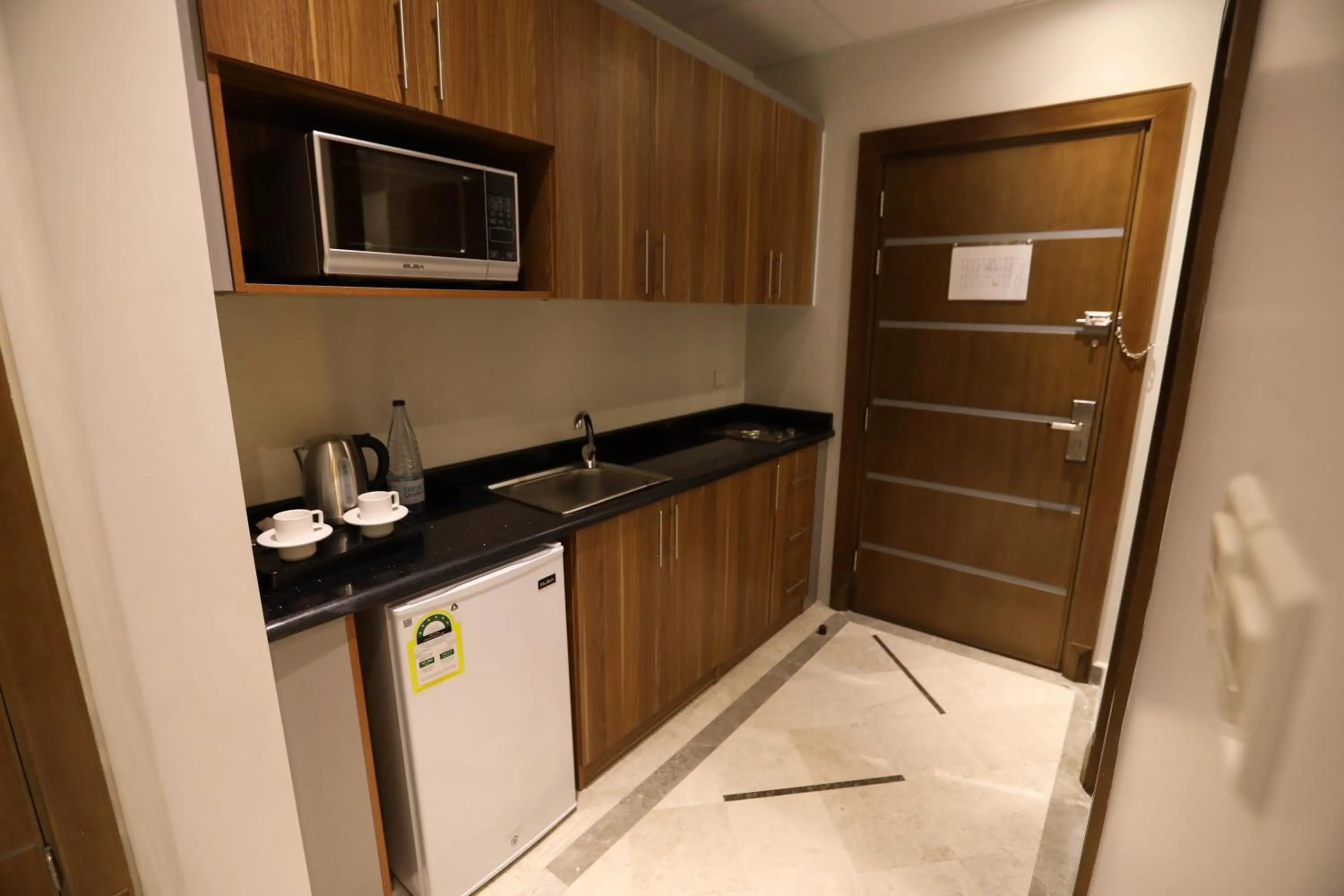 Kitchen or kitchenette in Diamond Tower Hotel
