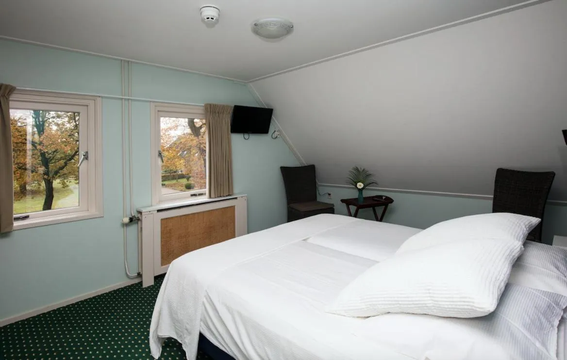 Bed in De Herberg van Anderen