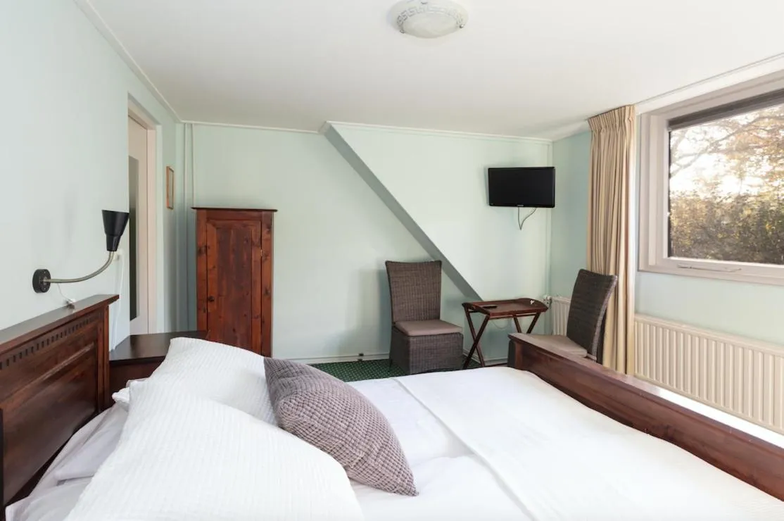 Bed in De Herberg van Anderen