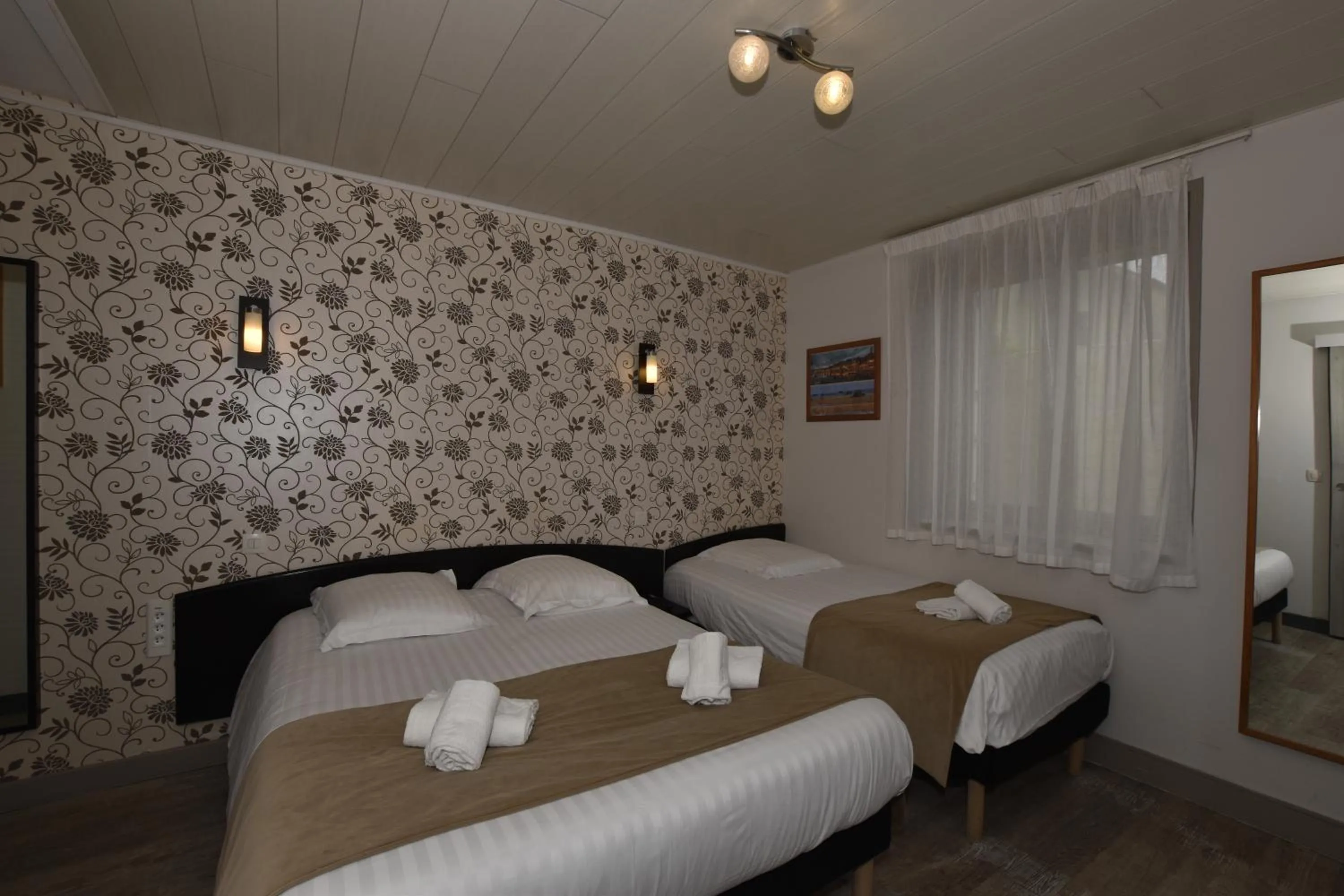 Bed in Hôtel Le Bayeux