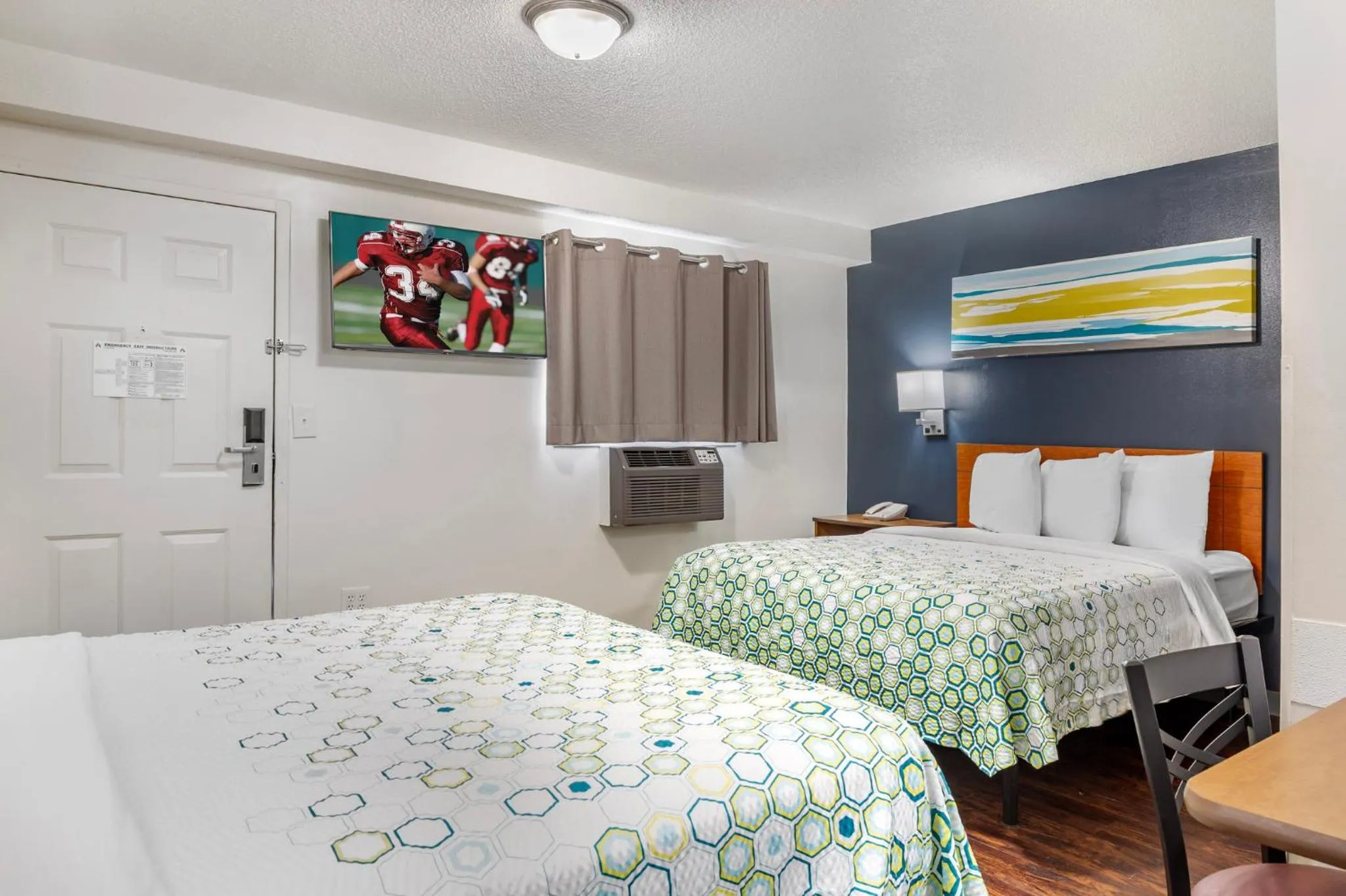 Photo of the whole room, Bed in HomeTowne Studios by Red Roof Louisville