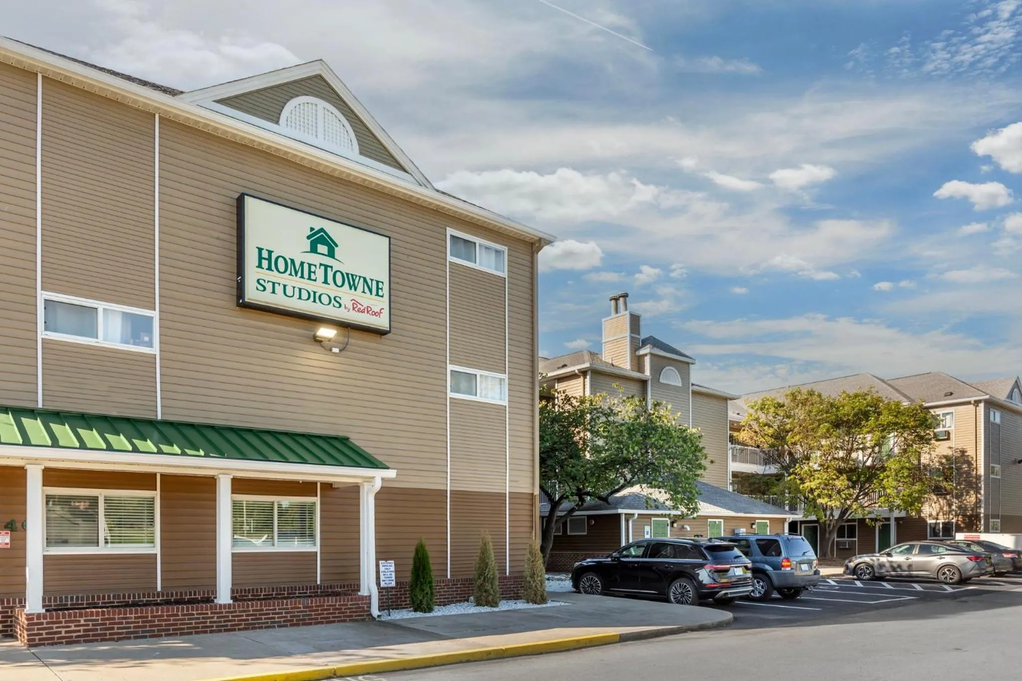 Property building in HomeTowne Studios by Red Roof Louisville
