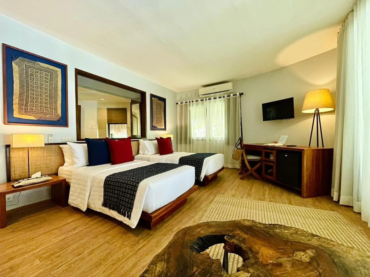 Photo of the whole room, Bed in Amun Ini Beach Resort & Spa