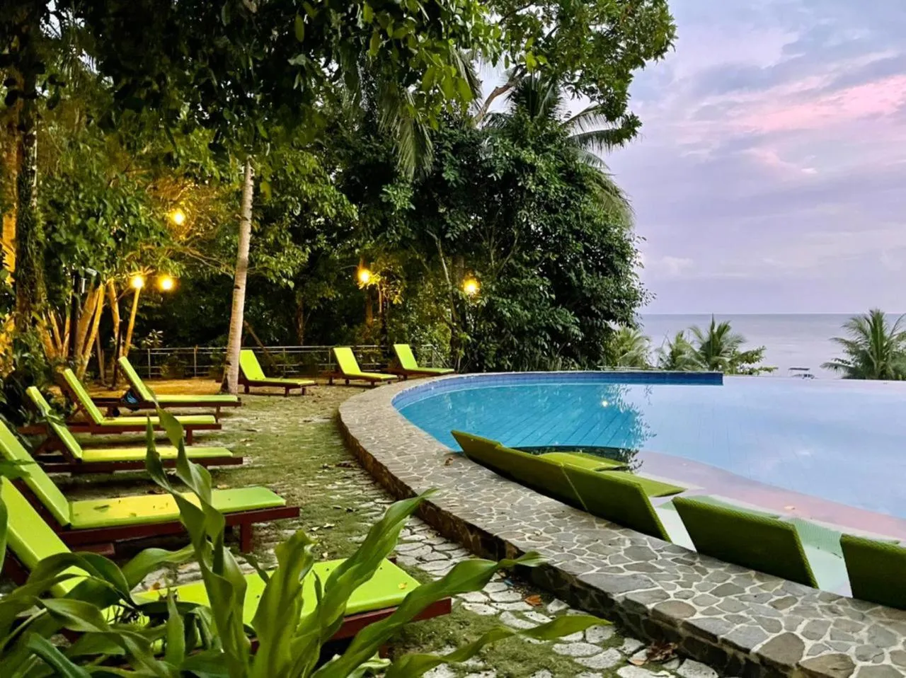 Swimming pool in Amun Ini Beach Resort & Spa