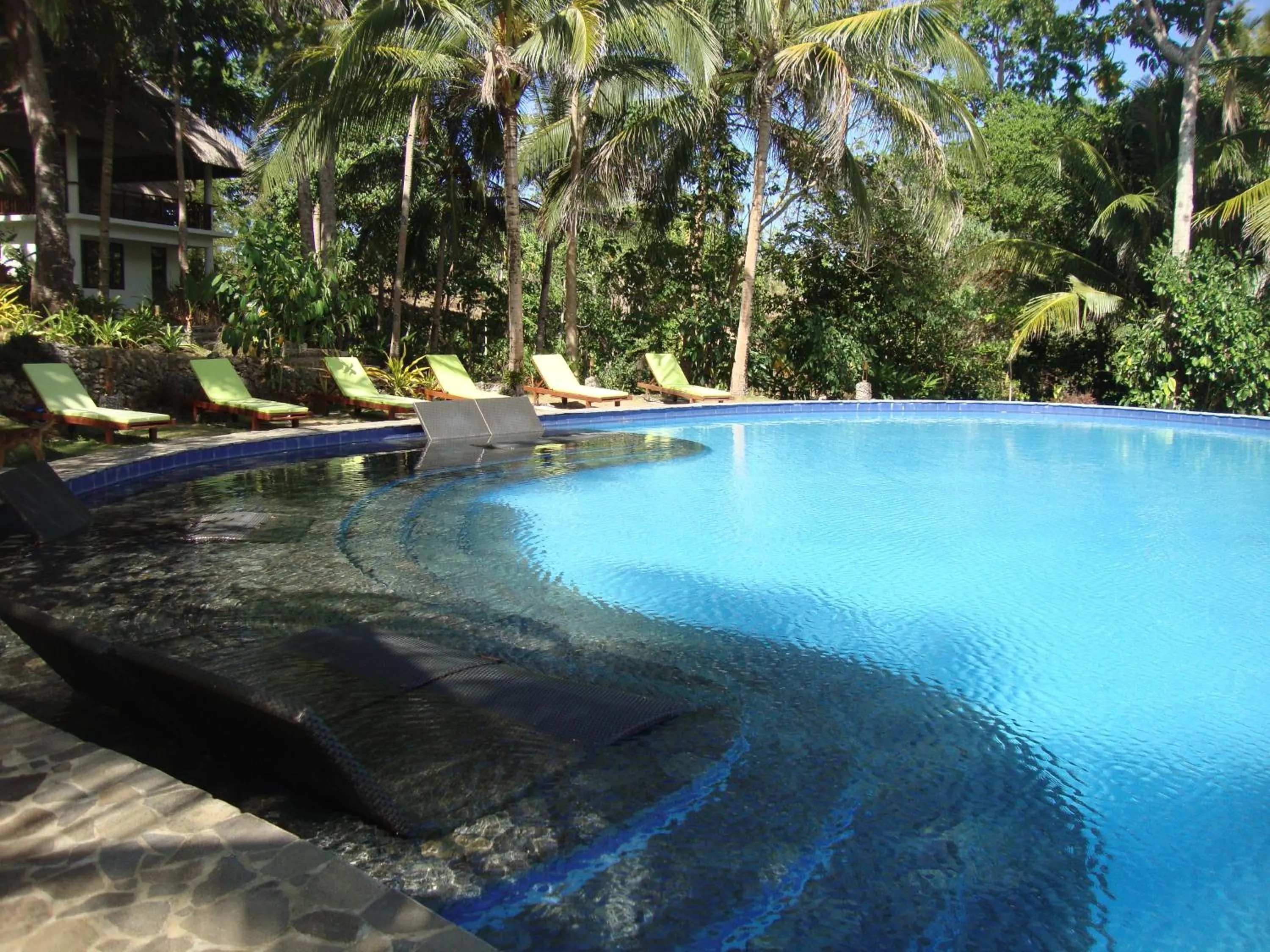 Swimming pool in Amun Ini Beach Resort & Spa
