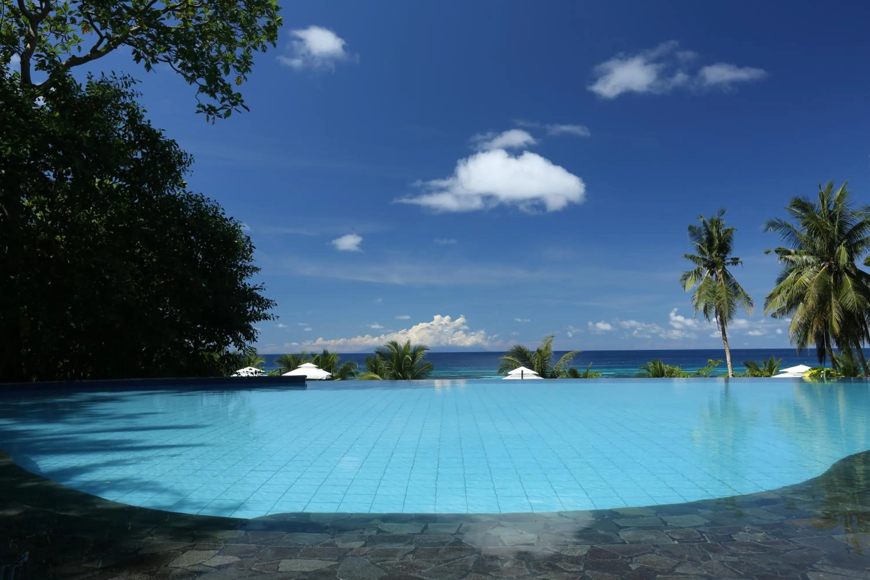 Swimming pool in Amun Ini Beach Resort & Spa
