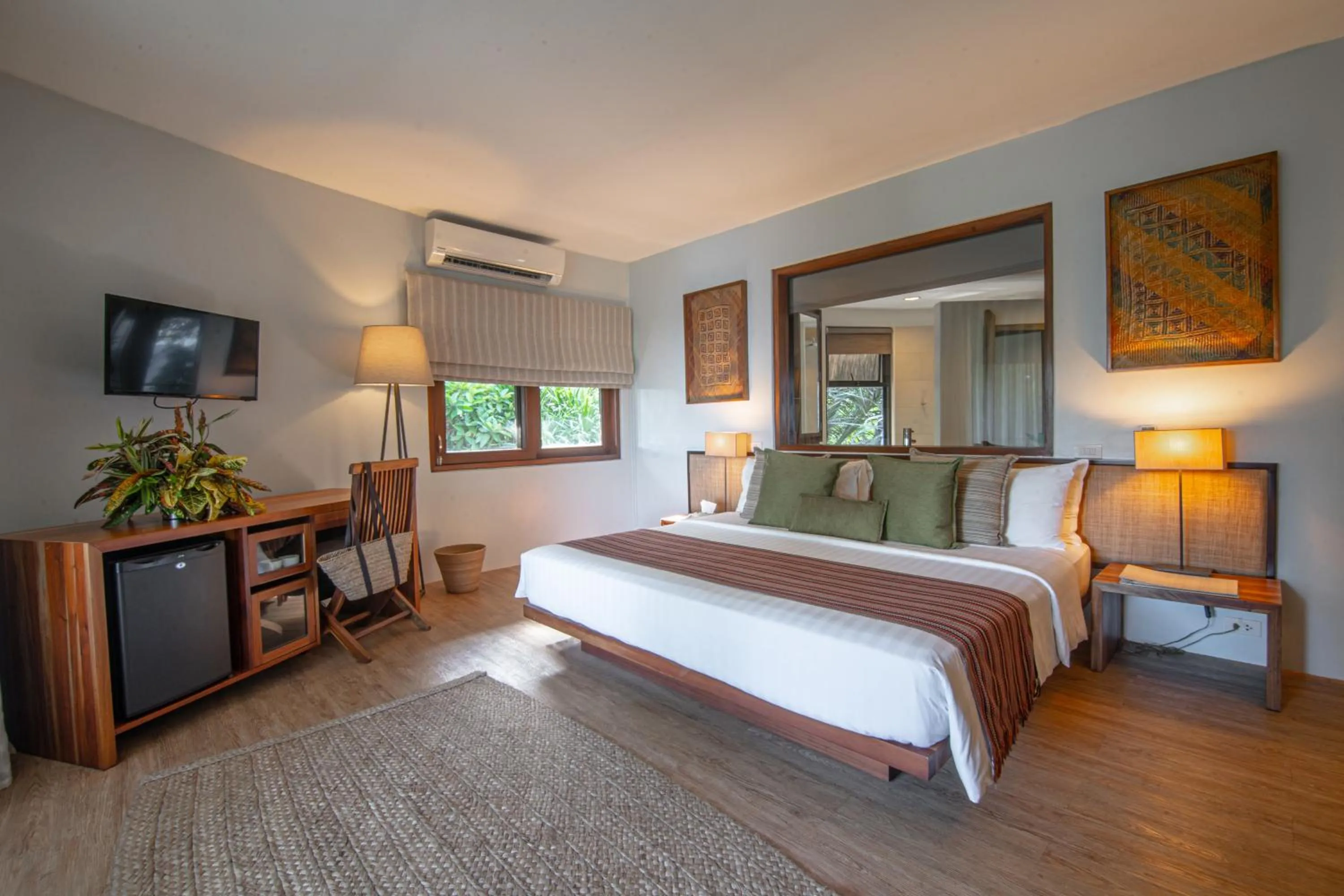 Bed in Amun Ini Beach Resort & Spa