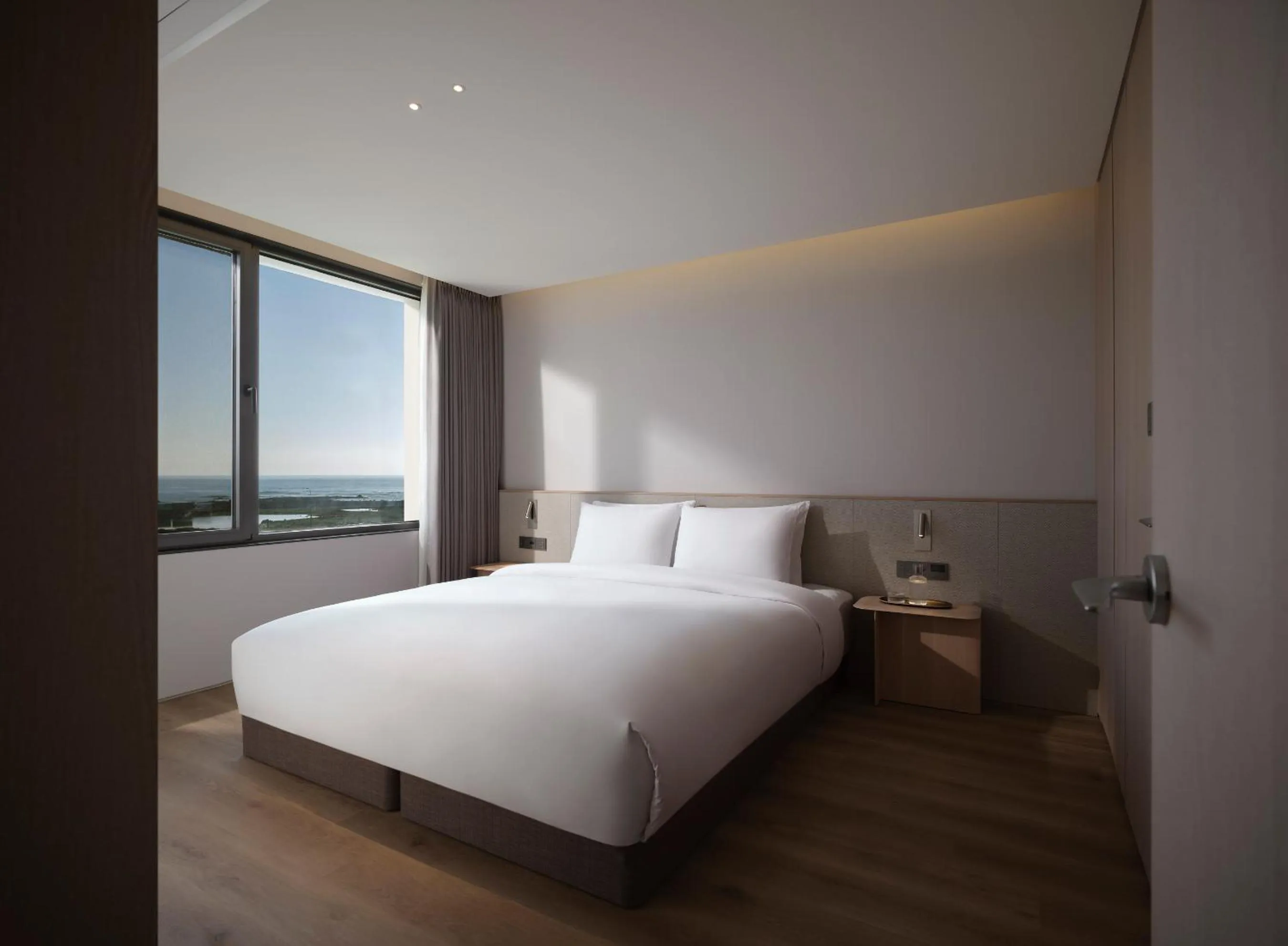 Bedroom, Bed in Haevichi Hotel & Resort Jeju