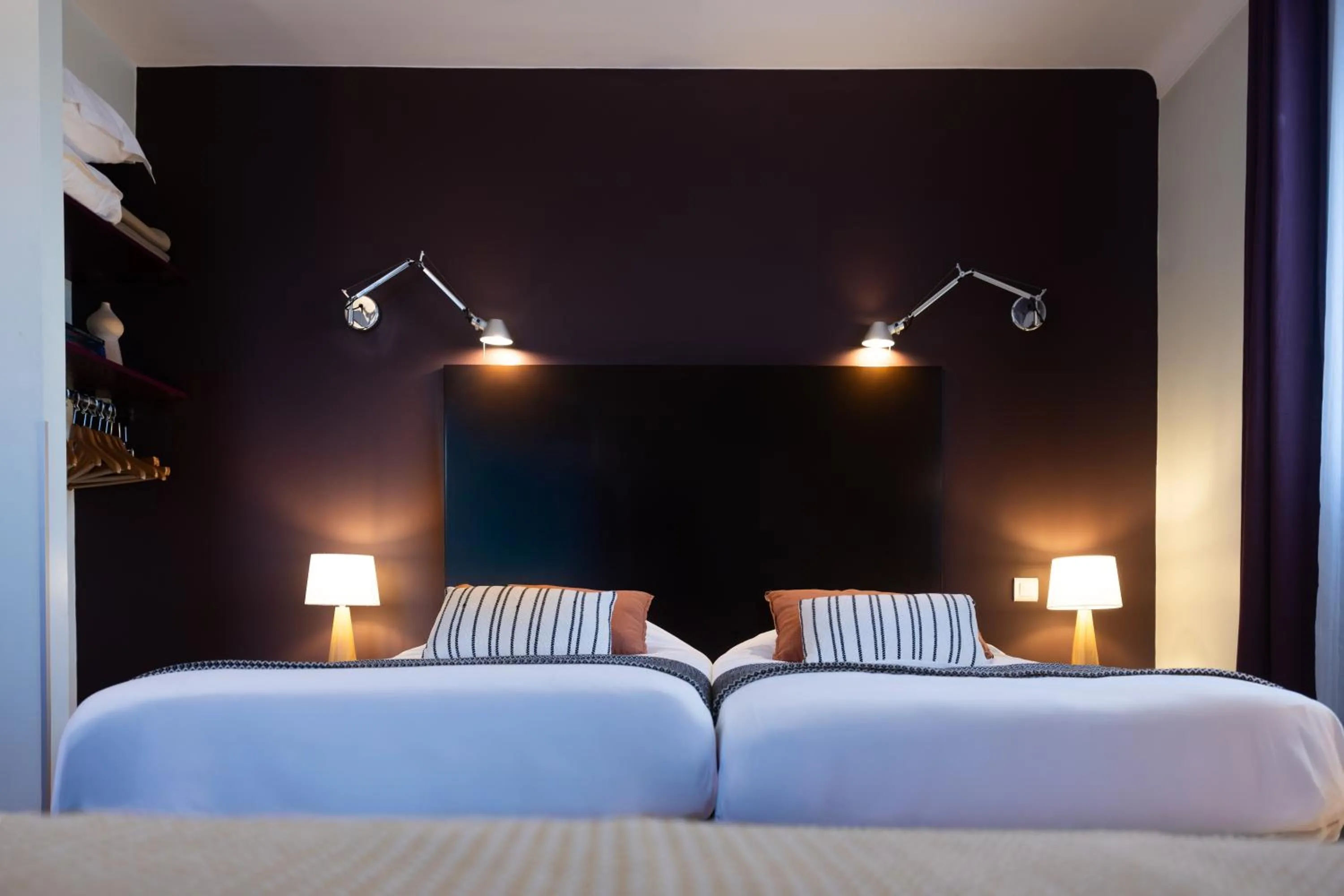 Photo of the whole room, Bed in Hôtel les jardins du canal - solaire eco reponsable - piscine - parking - garage - bornes électriques - accueil vélos - kids friendly