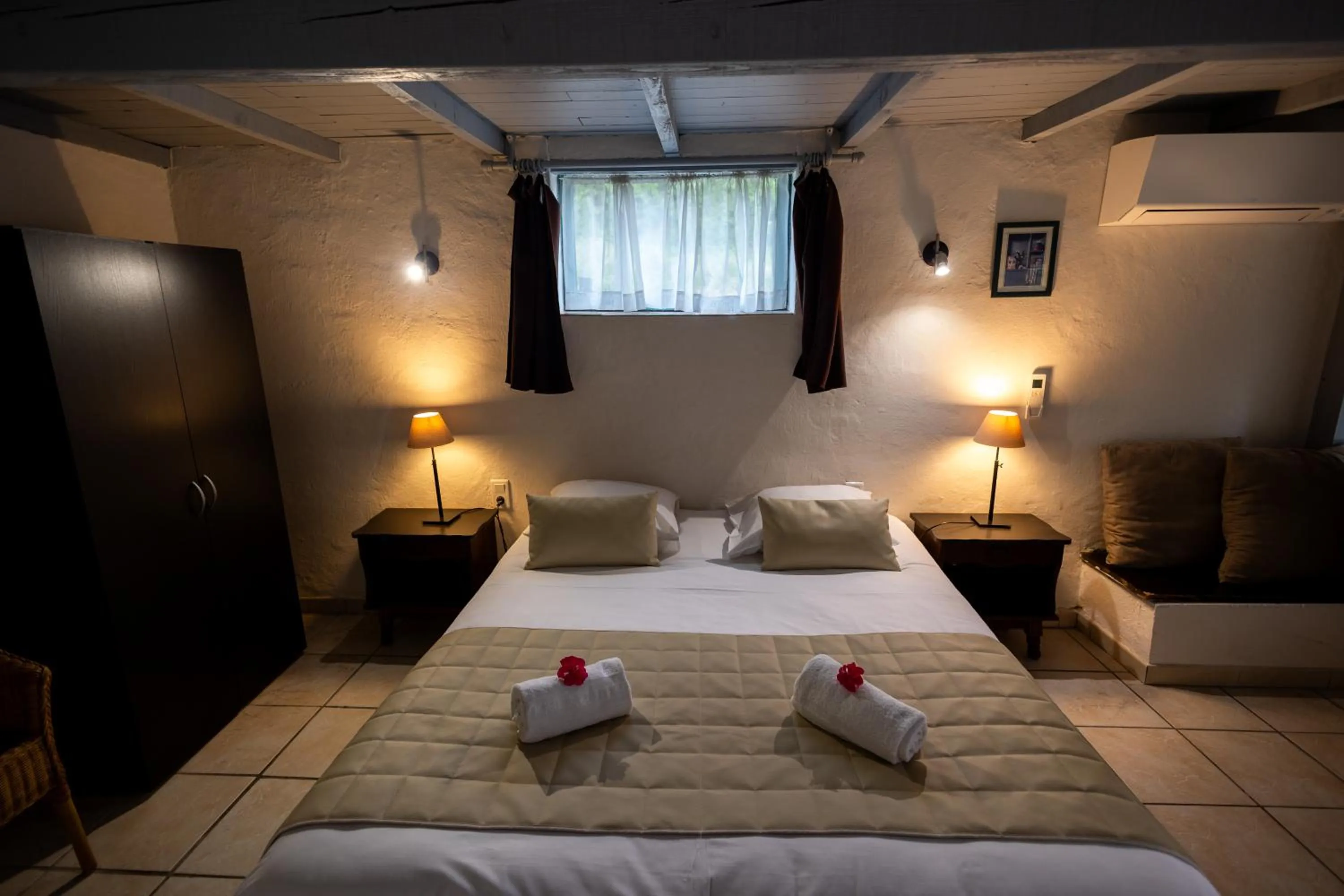 Bed in Logis des Crêtes de Pignols