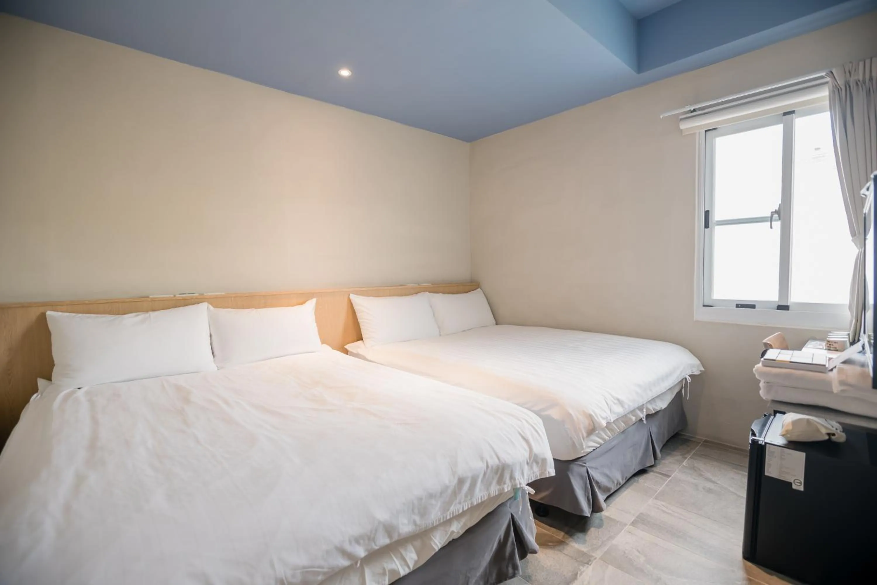 Bed in Tiin Tinn Inn - Tiehua Xiutai