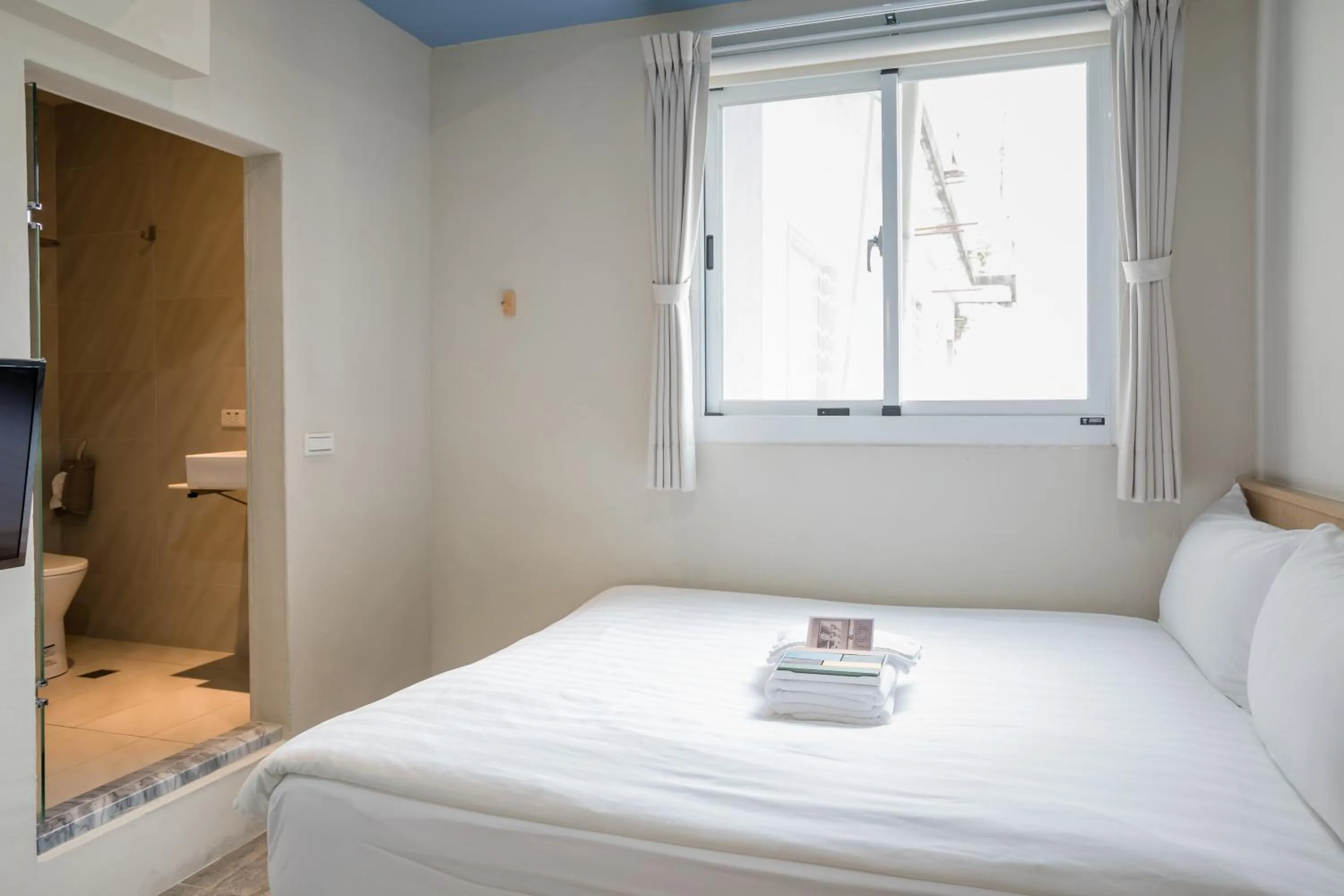 Bed in Tiin Tinn Inn - Tiehua Xiutai