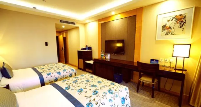 Bed in Beijing Yun-zen Jinling Lotus Hotel