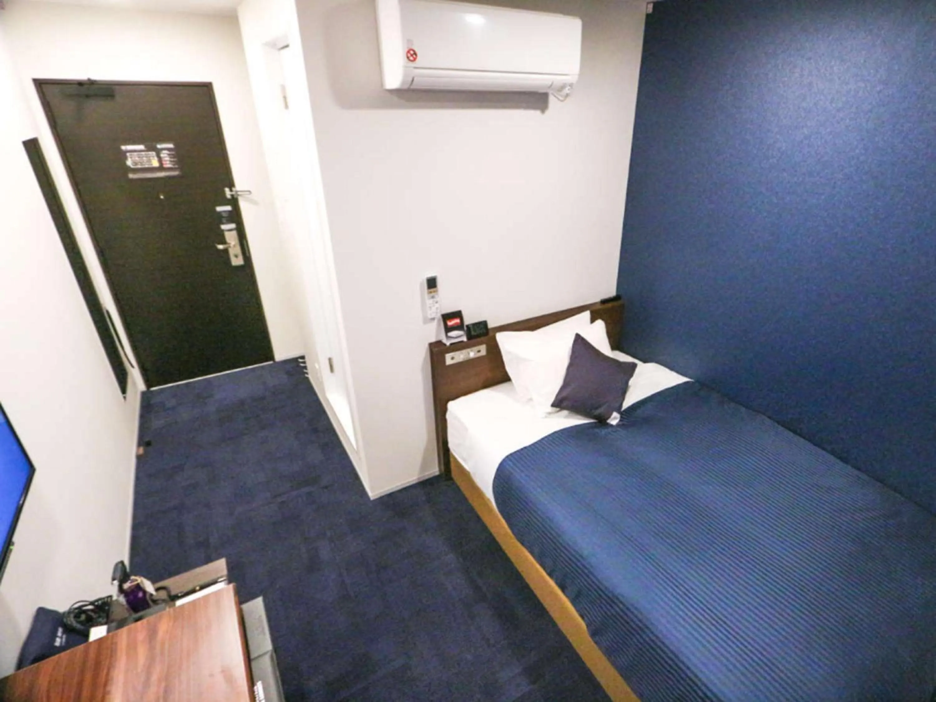 Bed in HOTEL LiVEMAX Nigata Nagaoka Station