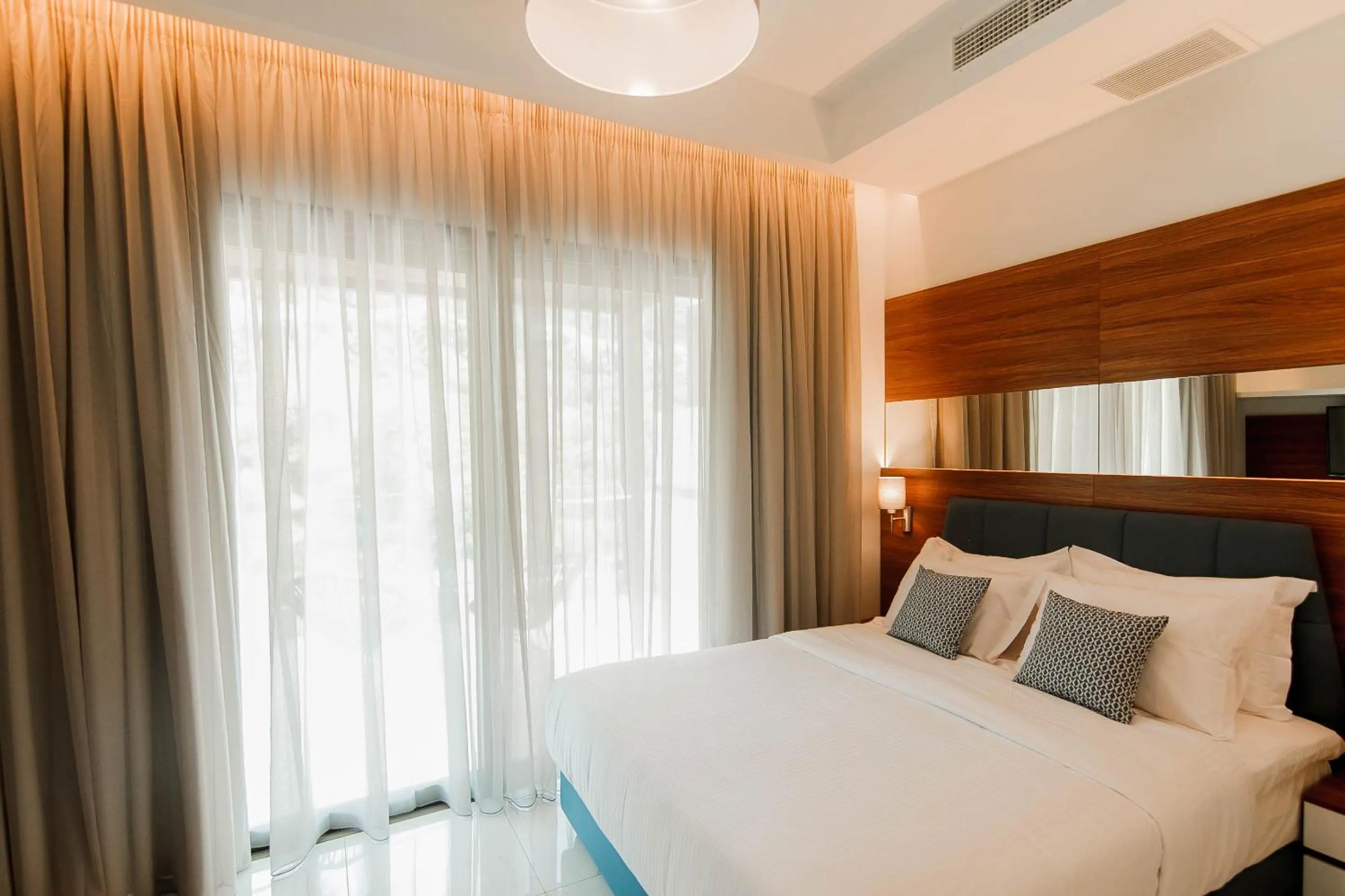 Bed in Elite Luxury Villas