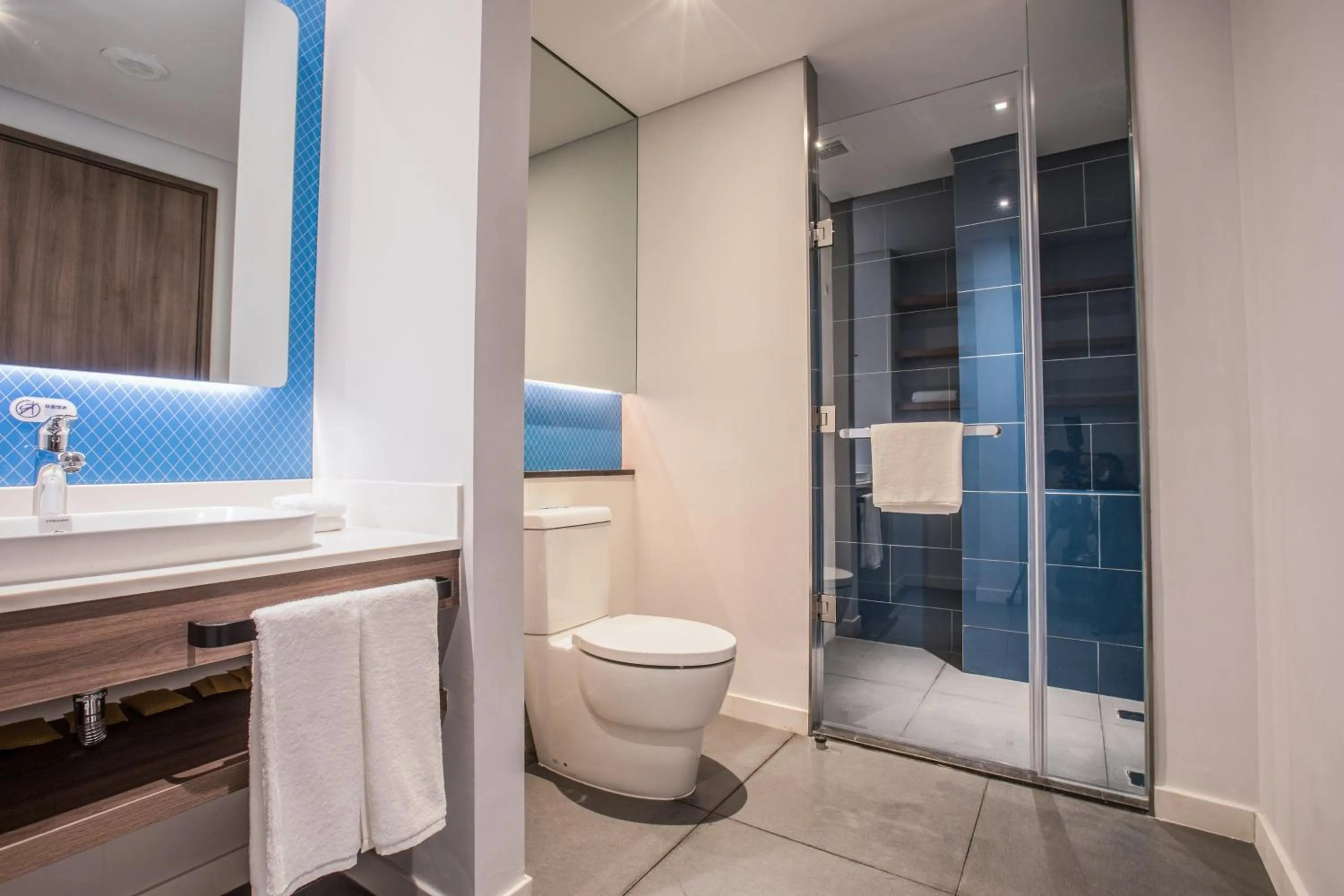 Bathroom in Holiday Inn Express Guizhou Qinglong by IHG