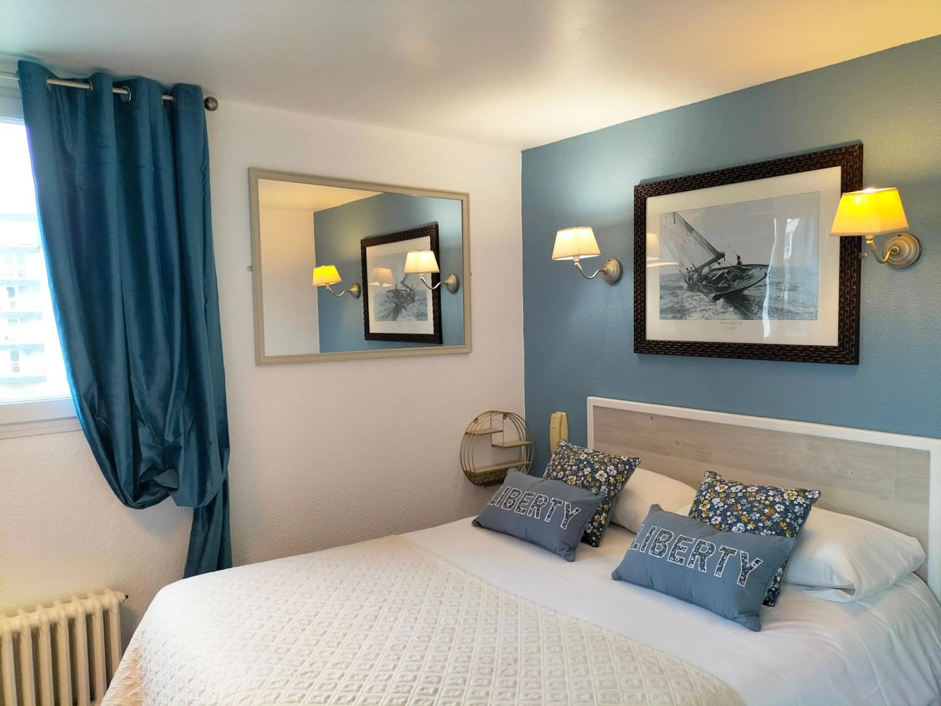 Decorative detail, Bed in Logis HOTEL RESTAURANT La Régence